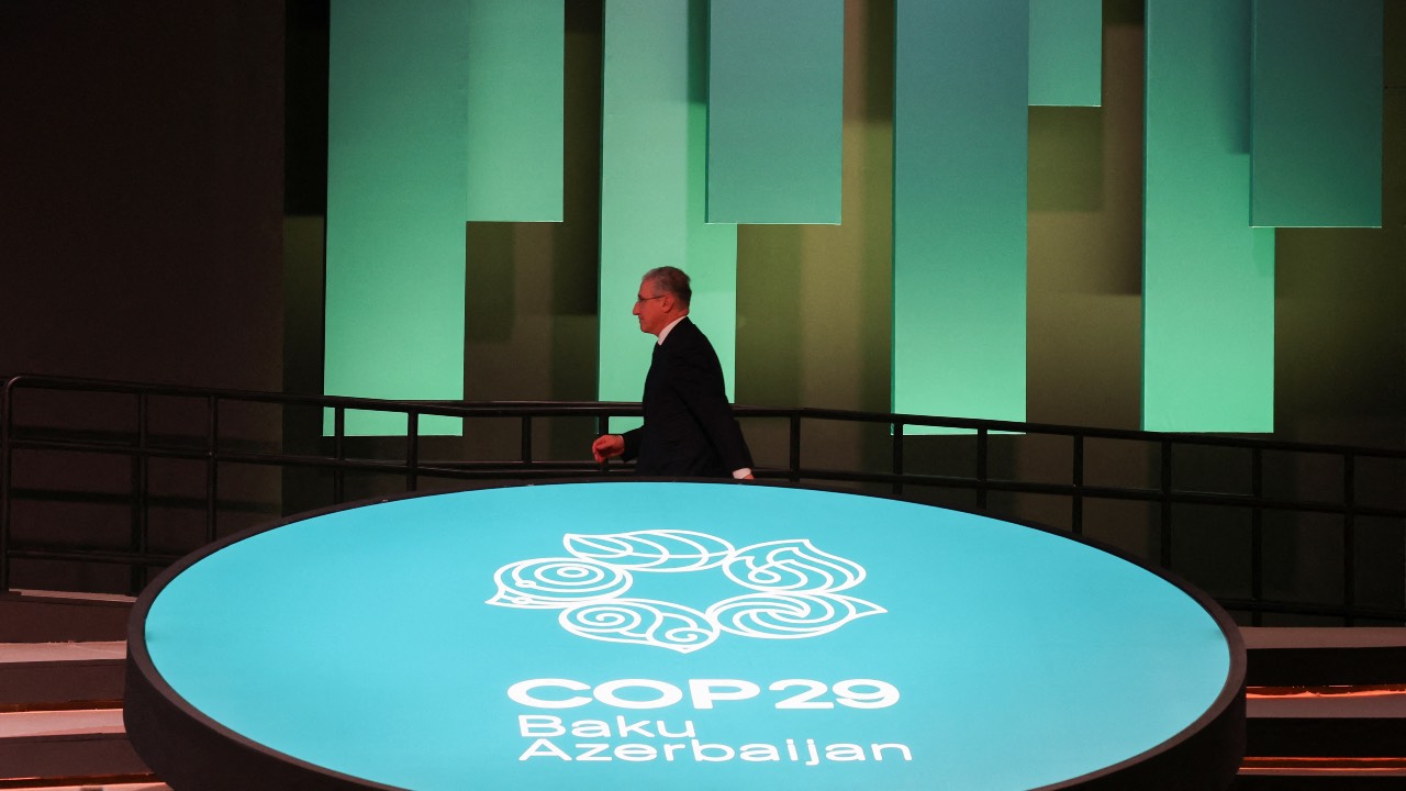 COP29 President Mukhtar Babayev walks during a closing plenary meeting at the United Nations Climate Change Conference, in Baku, Azerbaijan. /Murad Sezer/Reuters