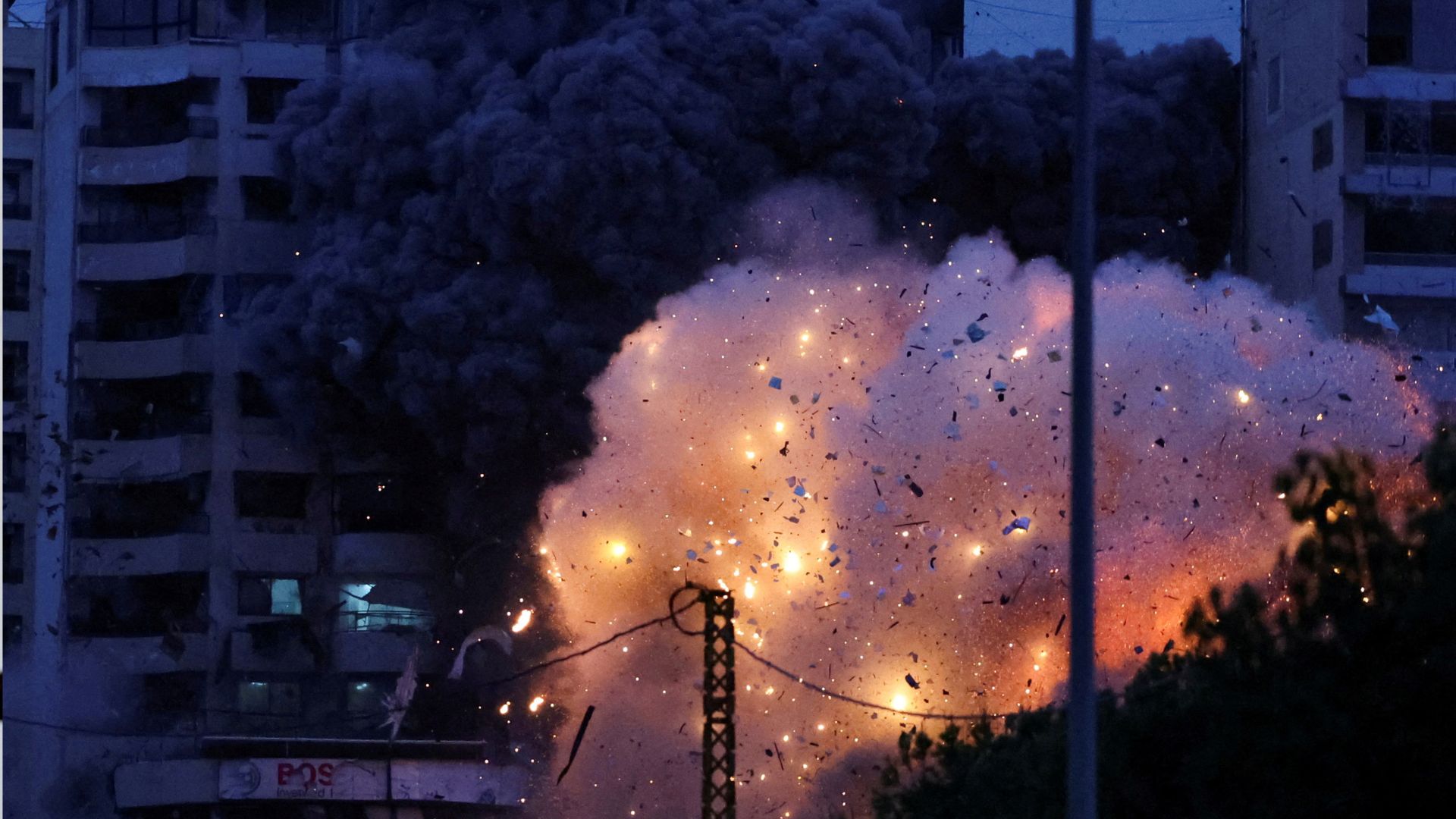 Smoke and flame rise after an Israeli strike, in the Chiyah district of Beirut's southern suburbs on Monday. /Mohamed Azakir/Reuters