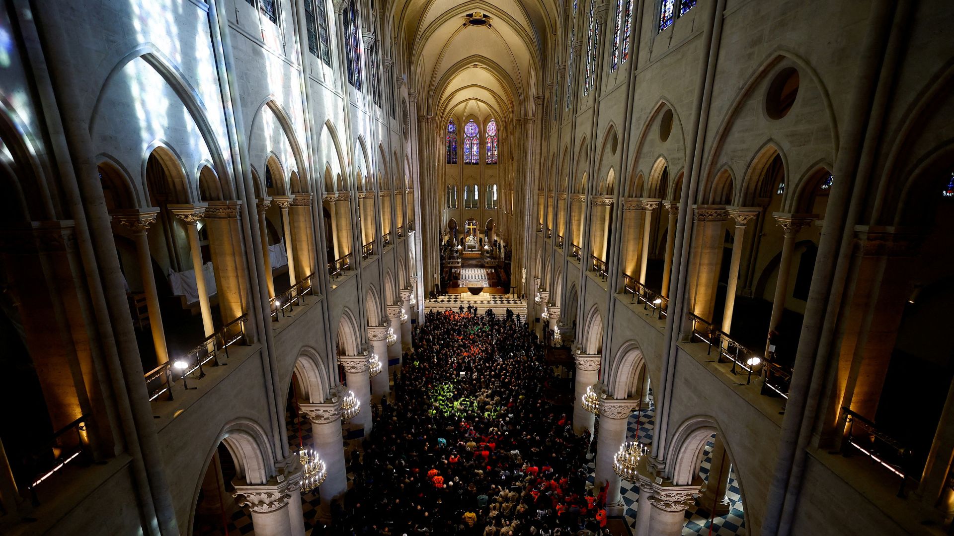 French President Emmanuel Macron delivers a speech in the nave of the Notre-Dame de Paris Cathedral, which was ravaged by a fire in 2019. /Sarah Meyssonnier/Pool