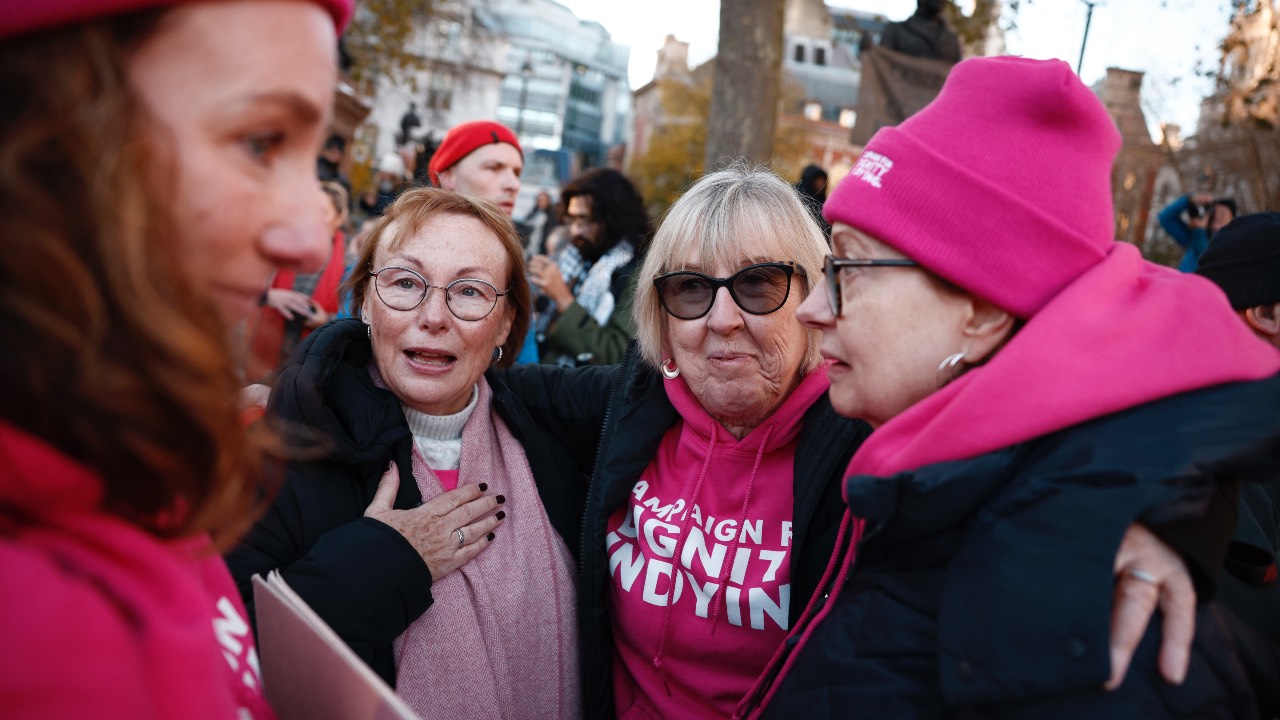 Campaigners in favor of the assisted suicide bill react after the bill to legalize euthanasia in the UK is passed, outside the Houses of Parliament in central London. /Benjamin Cremel/AFP