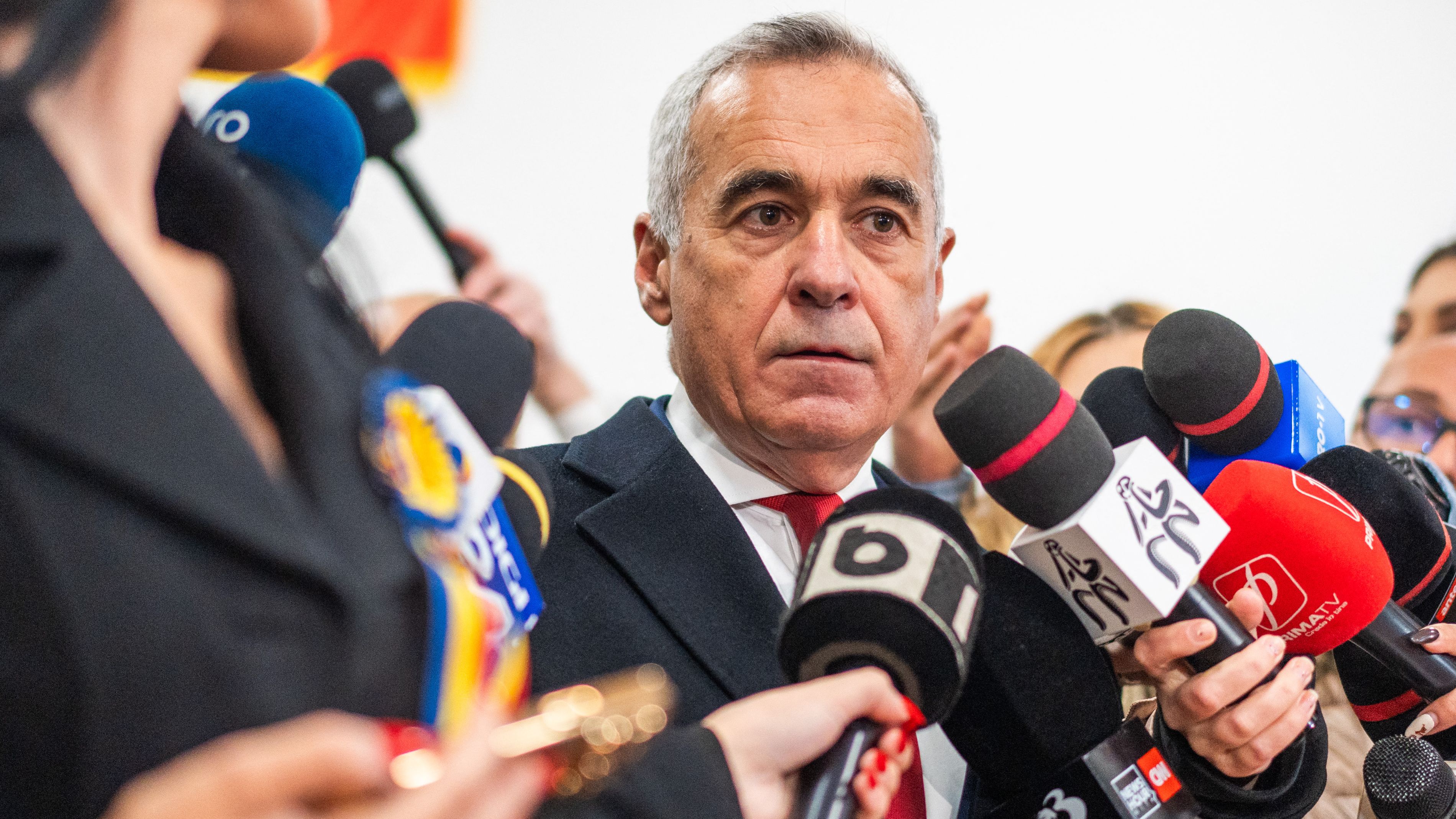 Romania's presidential candidate Calin Georgescu will feature in the run-off on December 8. / Mihai Barbu/AFP