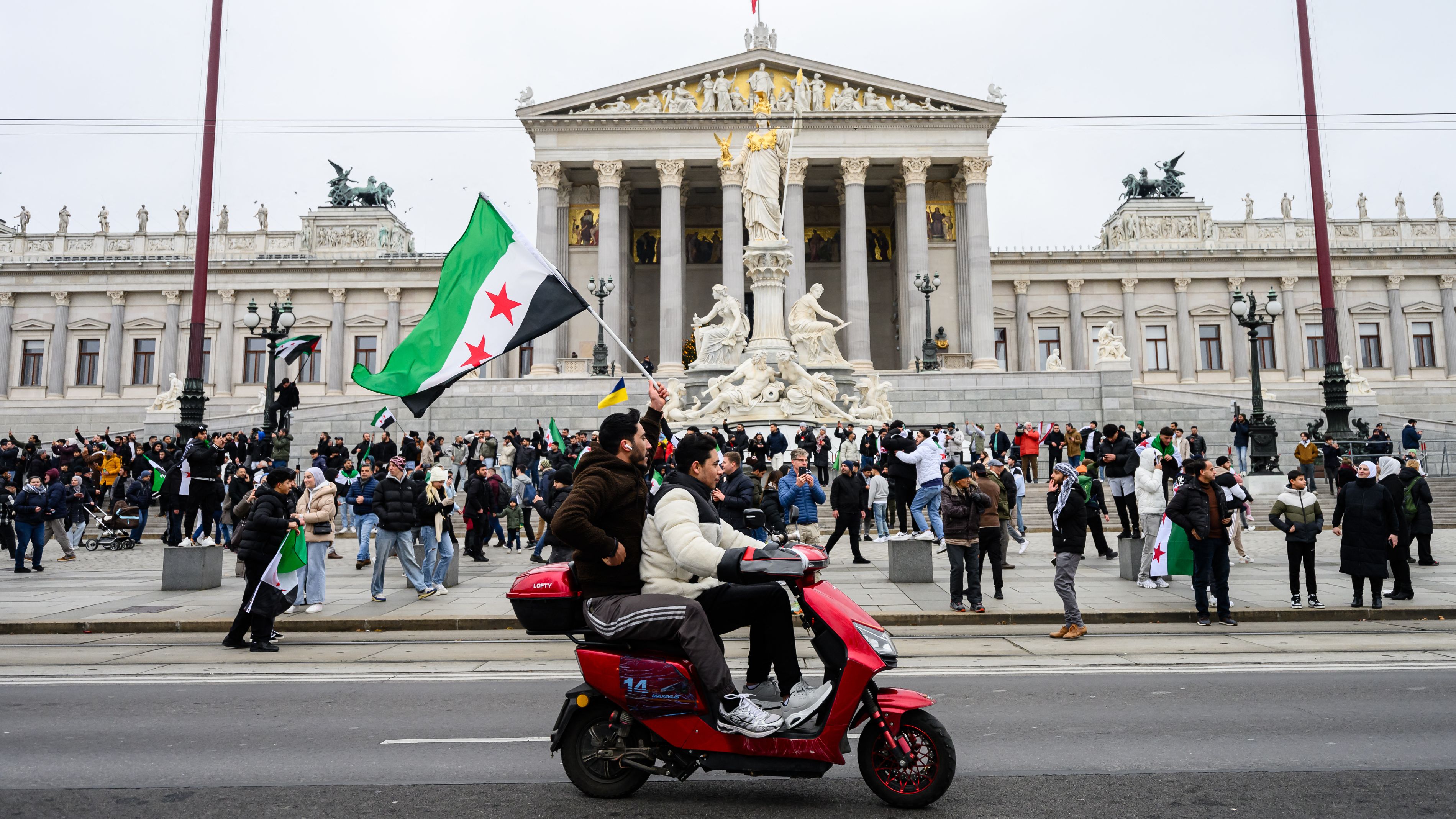 Members of the Syrian community celebrated in Vienna this week. /Max Slovencik/APA/AFP