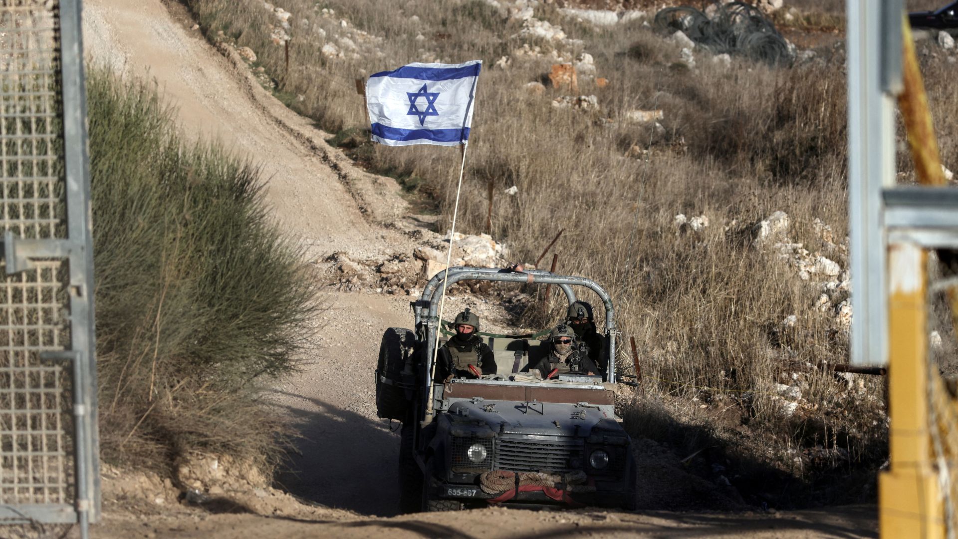 An Israeli military vehicle crosses the ceasefire line between Syria and the Israeli-occupied Golan Heights. /Jamal Awad/Reuters
