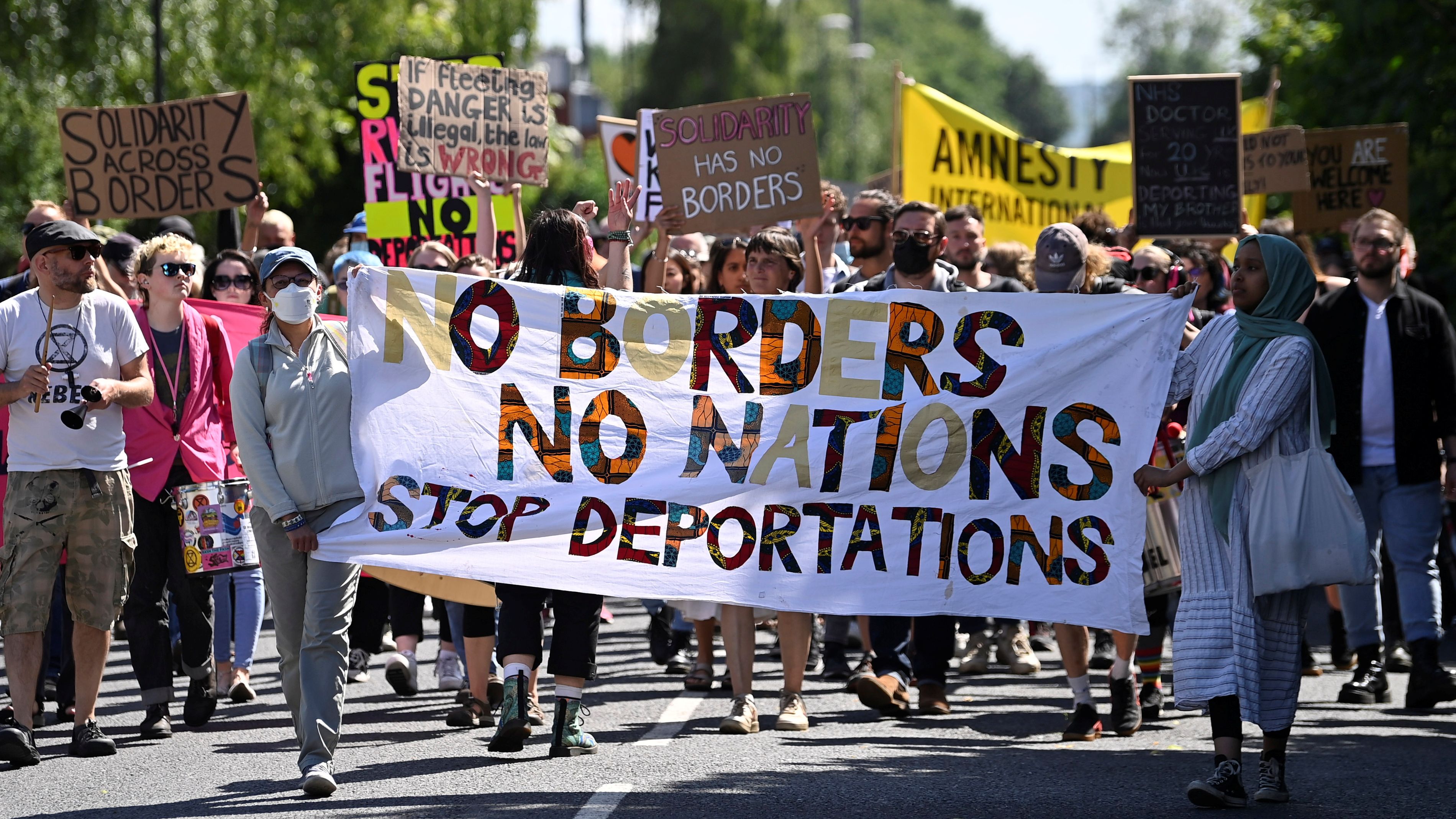 There were big protests across the UK over the previous government's policy for deporting asylum seekers to Rwanda. /Toby Melville/Reuters