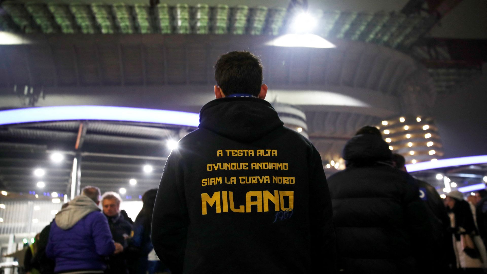 A fan wears Inter Milan ultras merchandise at the San Siro. /Alessandro Garofalo/Reuters
