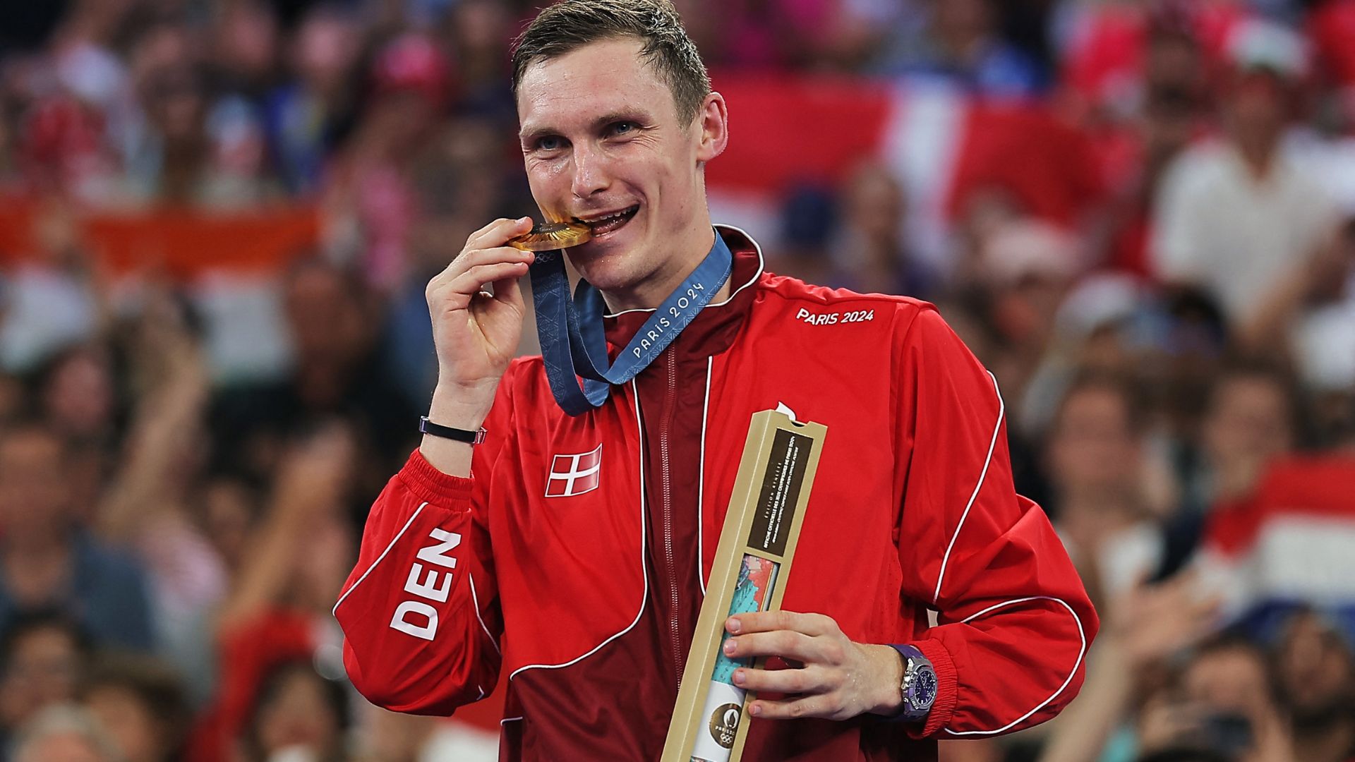 Champion Viktor Axelsen of Denmark enjoyed his Paris glory. /Ann Wang/Reuters