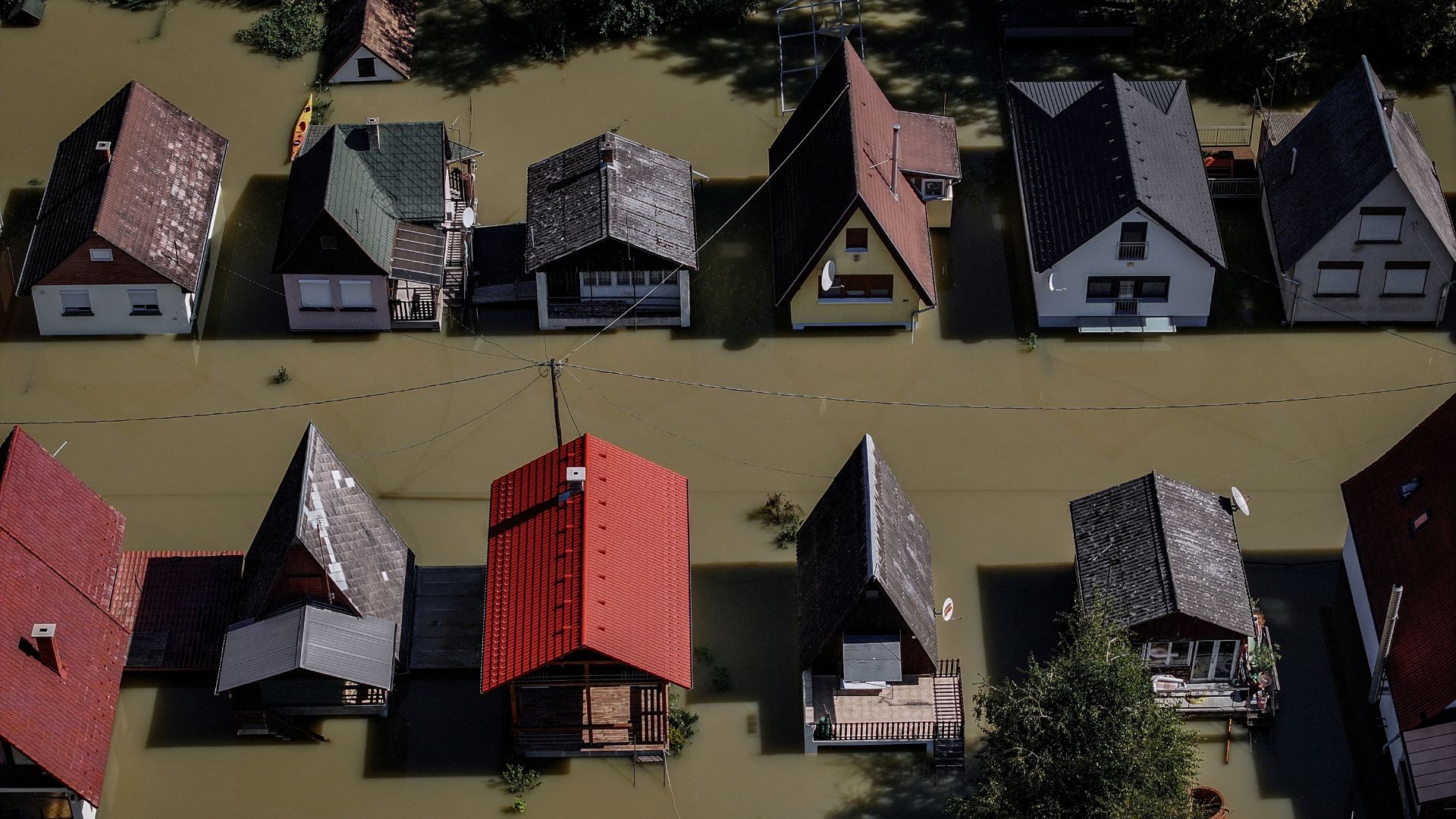 A drone view shows houses flooded by the Danube River in the village of Ersekcsanad, Hungary. /Marko Djurica/Reuters