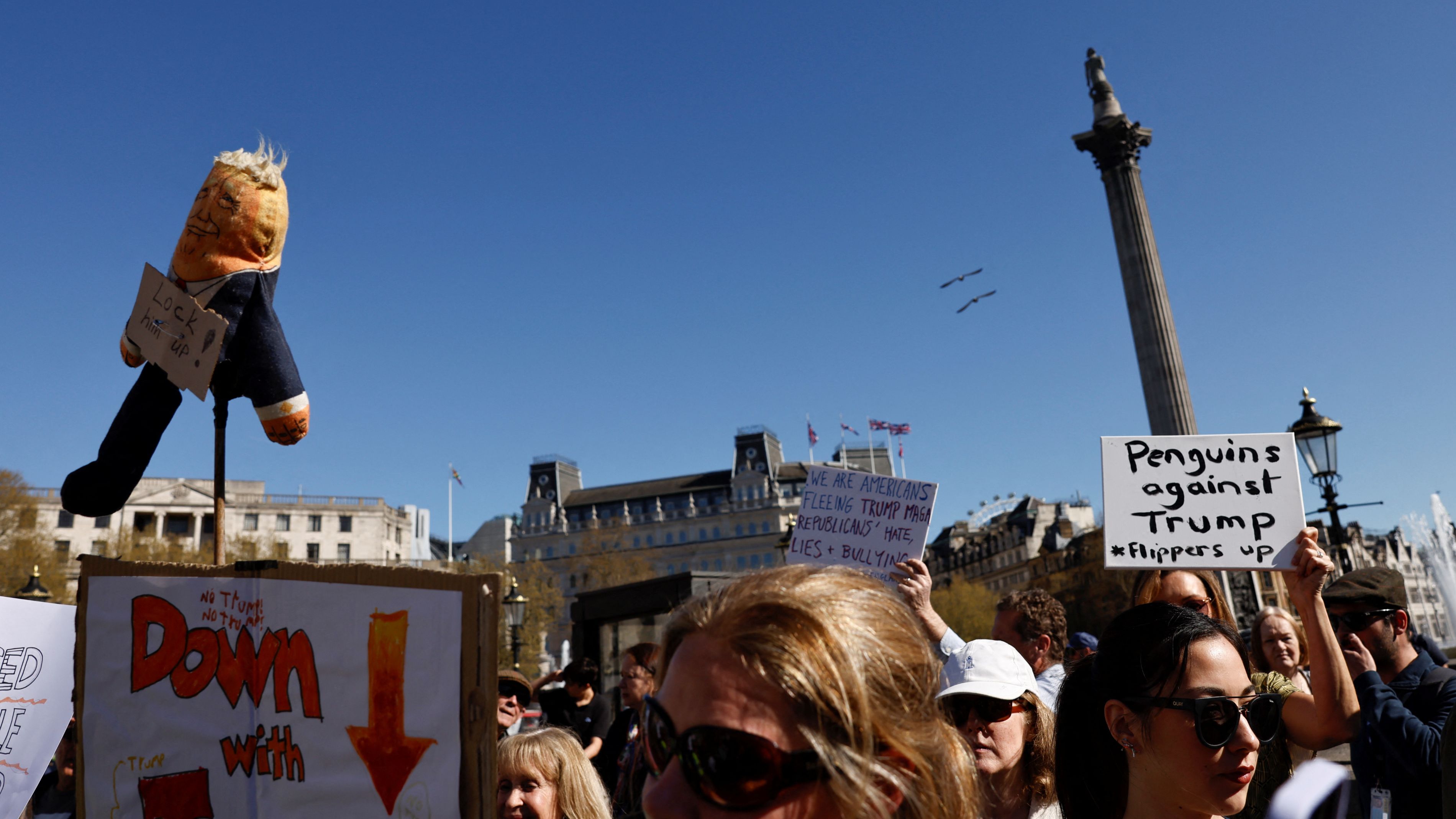 Protesters gathered at Trafalgar Square in London on Saturday. /Carlos Jasso/Reuters