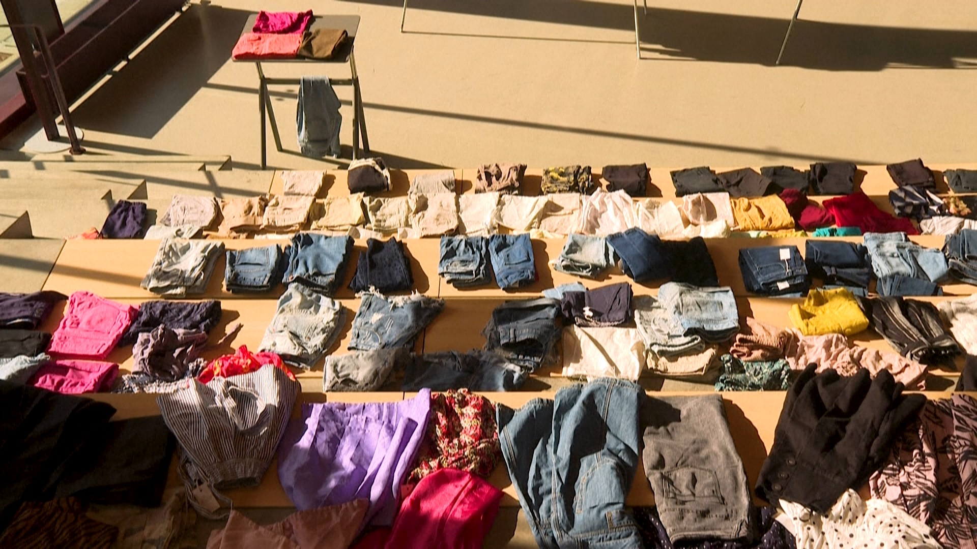Many want fashion firms to help with the surplus. /AFP