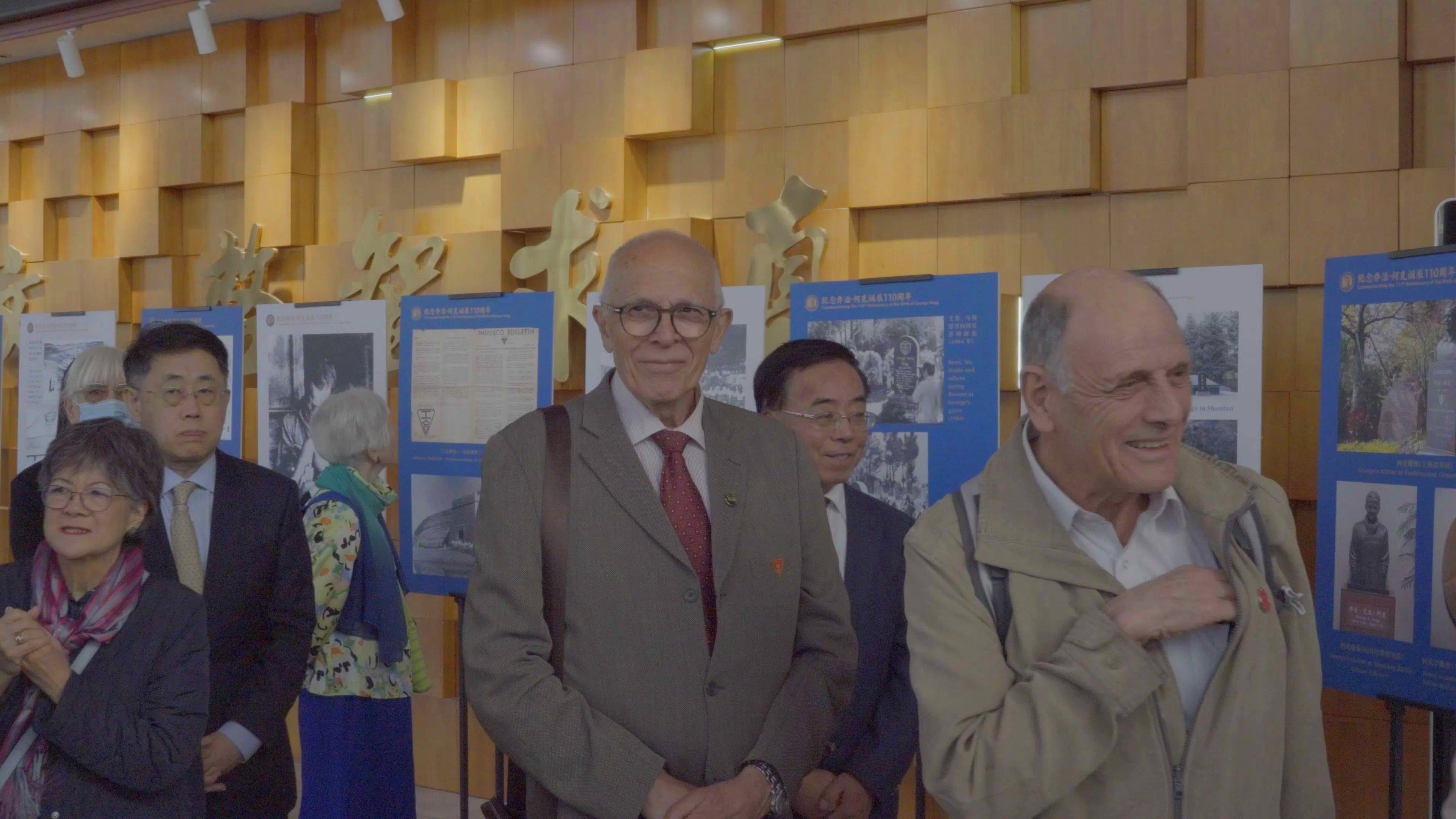 The British delegation is watching the photo exhibition in Lanzhou, Gansu. /CGTN Europe