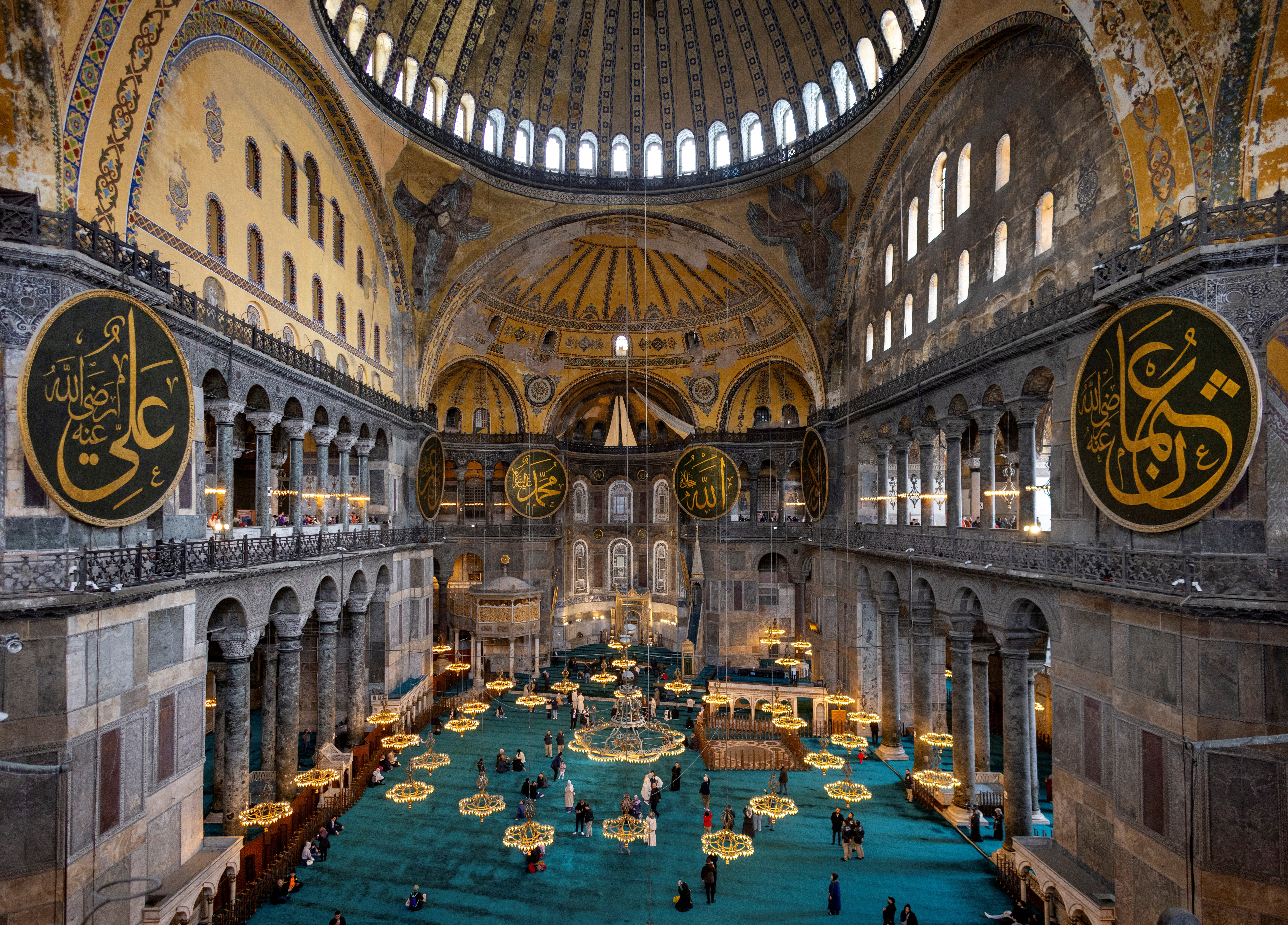 Tourists and worshippers visit Hagia Sophia Grand Mosque, while Turkey begins restoration work on dome, Istanbul, Turkey, April 14, 2025. REUTERS/Umit Bektas