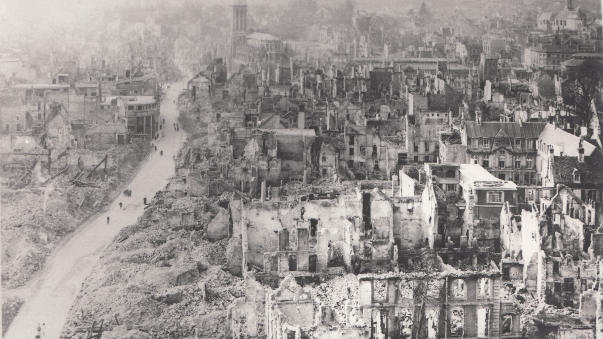 The French city occupied by one WWII side and flattened by the other