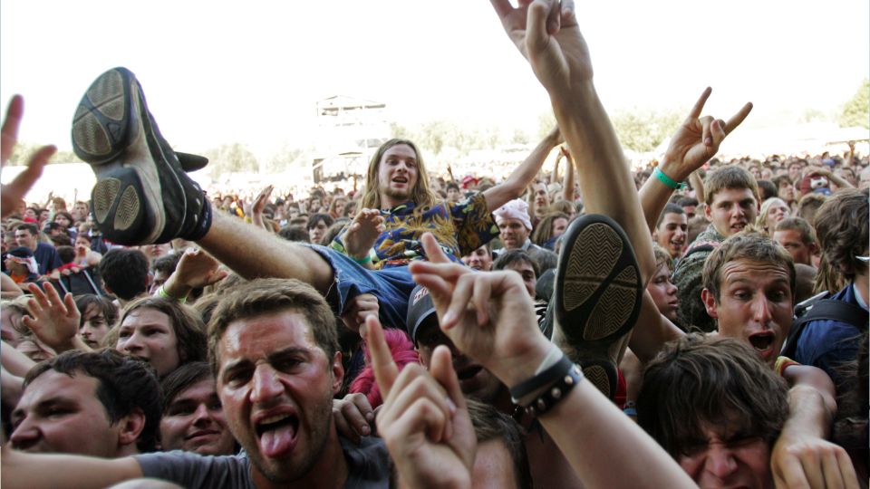 Revellers watch British group Morcheeba at Hungary's Sziget music festival in 2005 but their compatriots have found it costly to tour EU countries since Brexit. /Laszlo Balogh/Reuters
