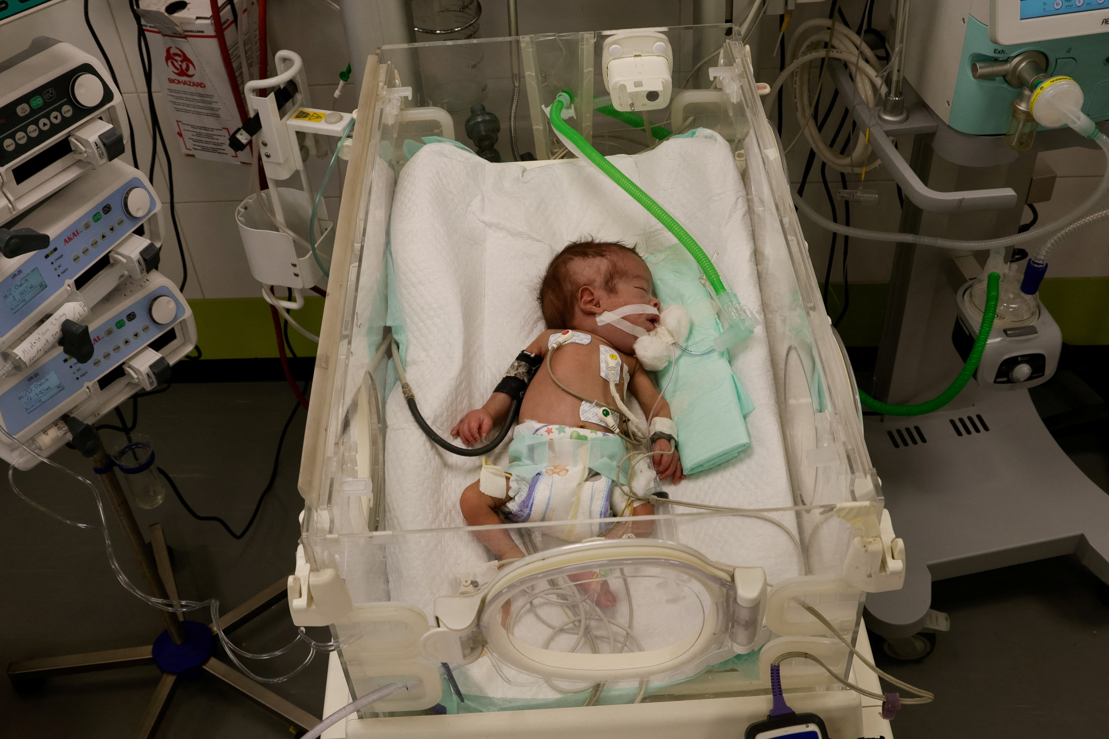 A Palestinian baby receives treatment in the emergency room at Nasser Hospital, in Khan Younis. /Hatem Khaled/Reuters

