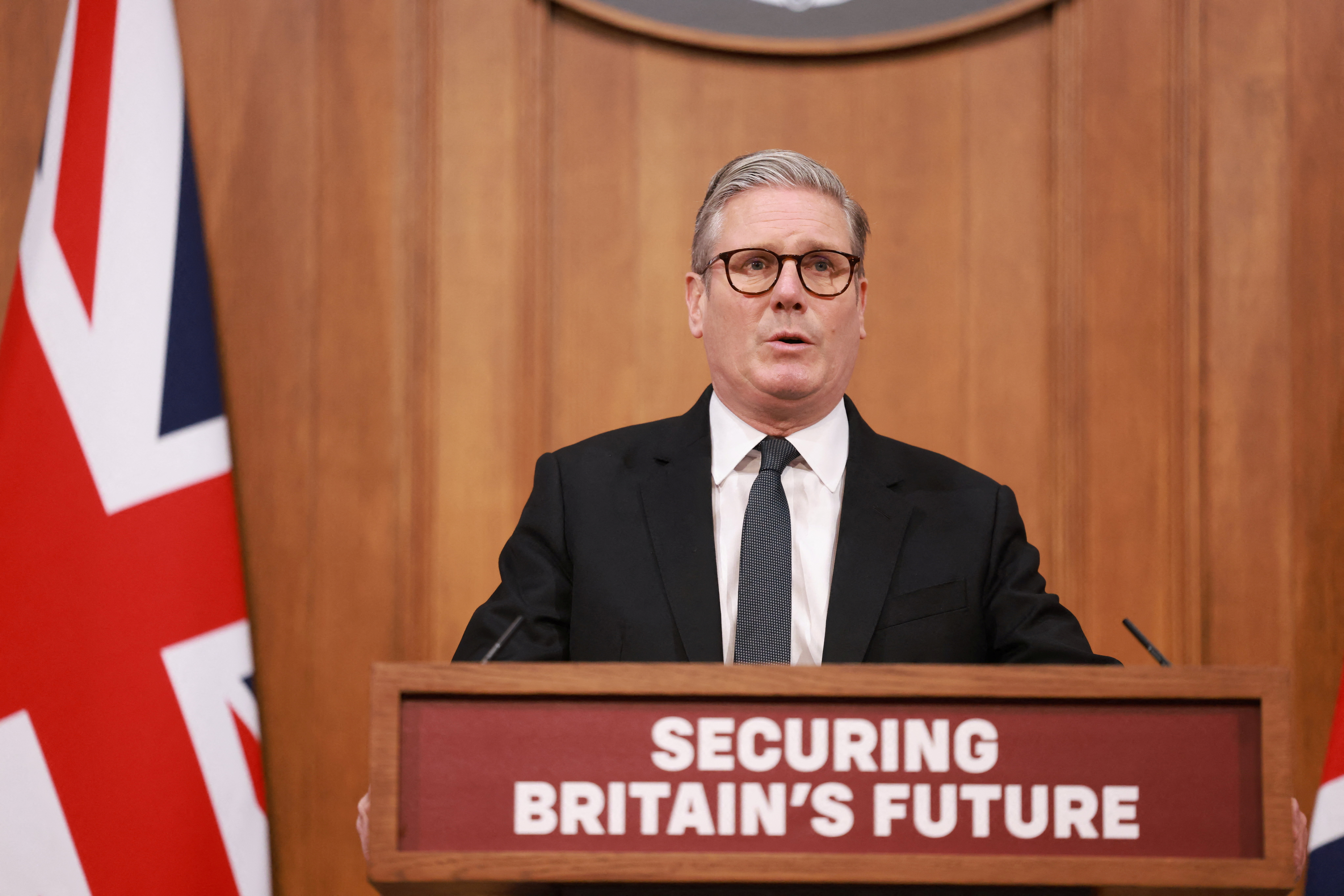 Britain's Prime Minister Keir Starmer delivers remarks at a press conference on migration, in London, Britain May 12, 2025. Ian Vogler/Pool