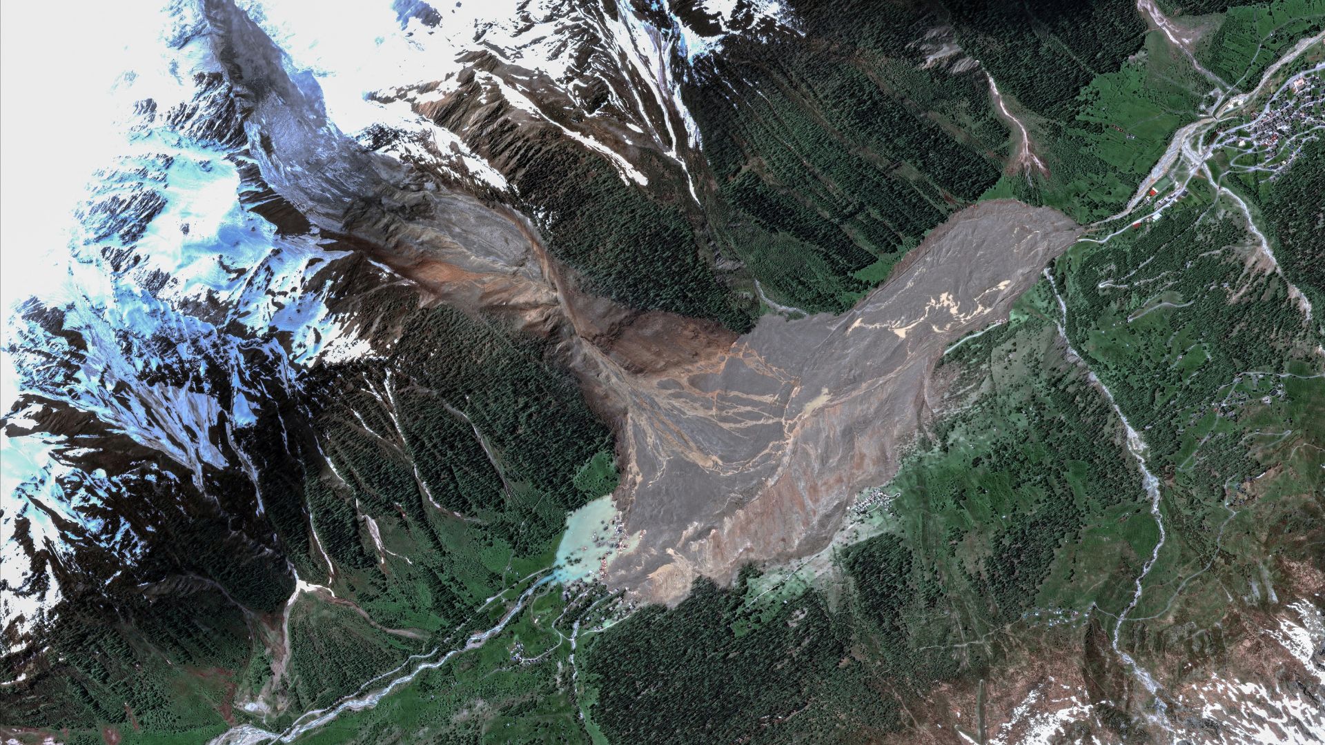 First glacier destroys Swiss village, now flood risk threatens valley