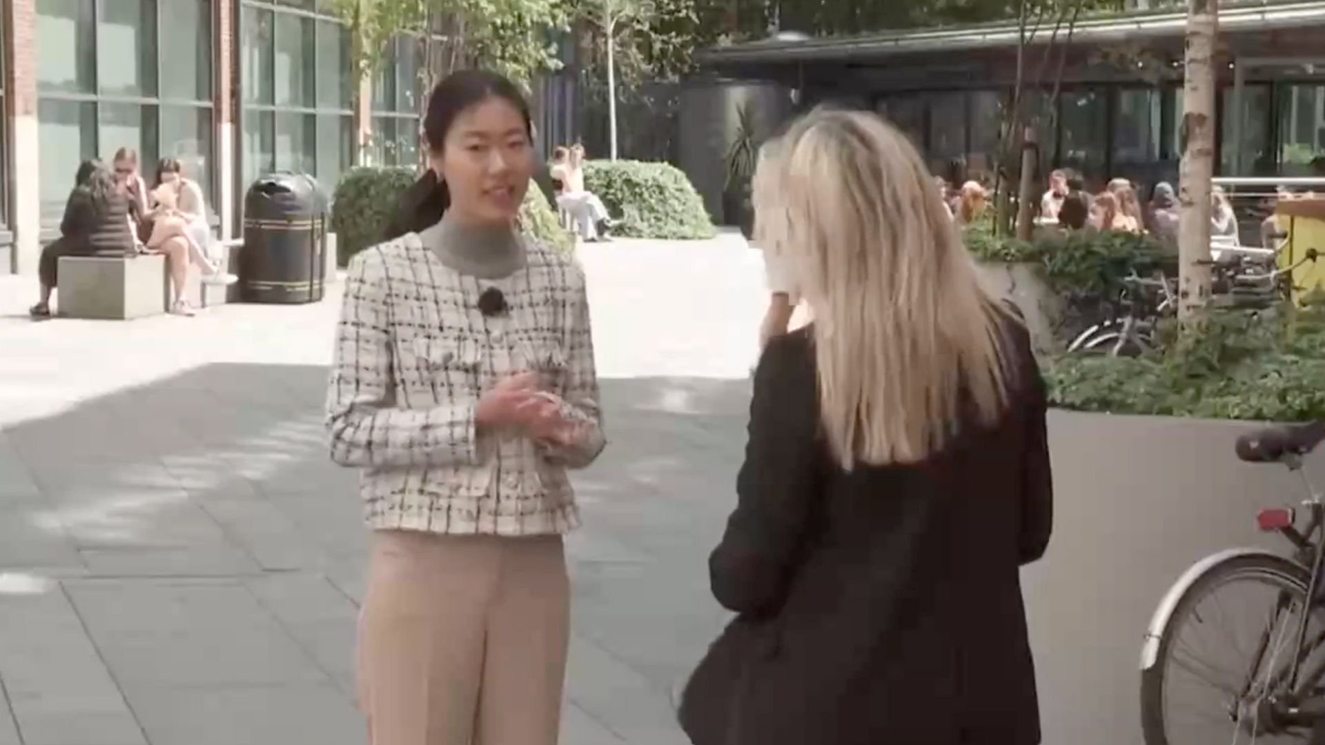 Charlene Song (L), a doctoral candidate at University College London's Institute of Education. /CGTN