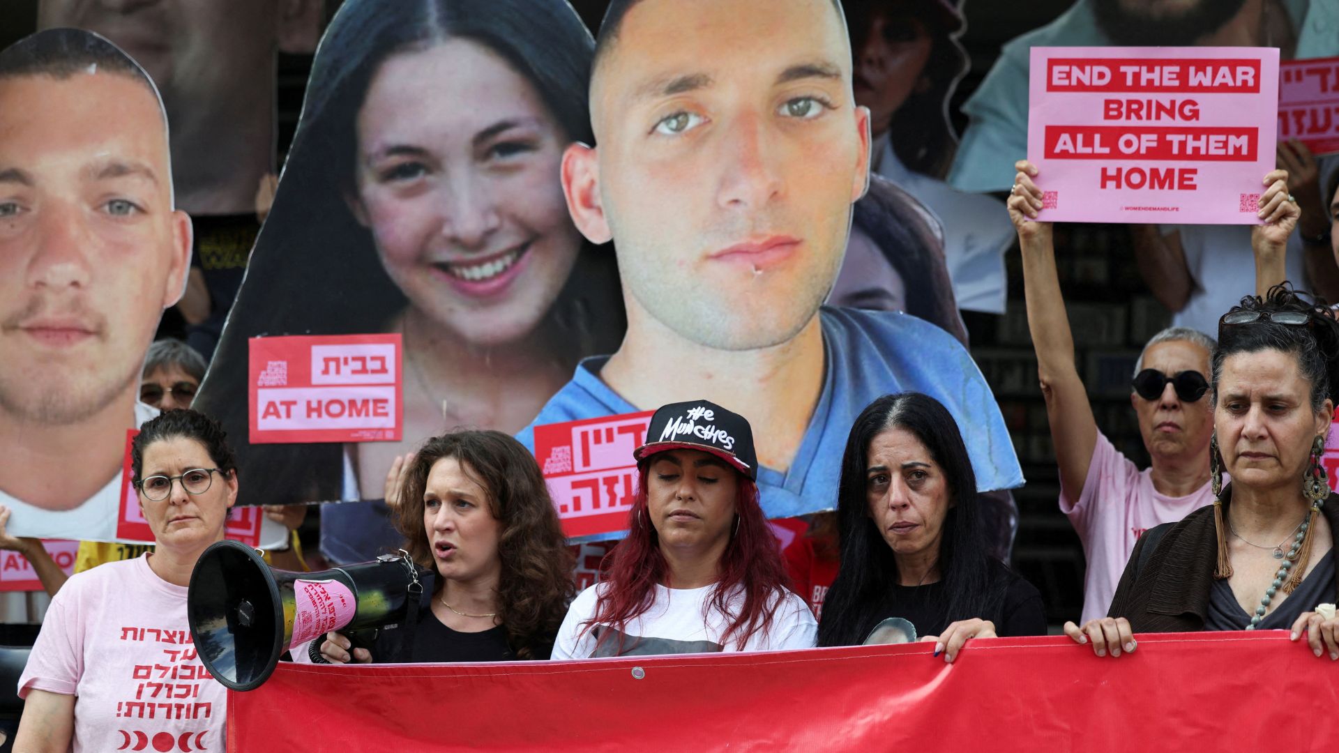 Hostage Matan Zangauker's mother Einav Zangauker and his girlfriend Ilana Gritzewsky, who was also held hostage in Gaza, take part in a protest demanding the immediate release of hostages in Tel Aviv on June 9. /Nir Elias/Reuters