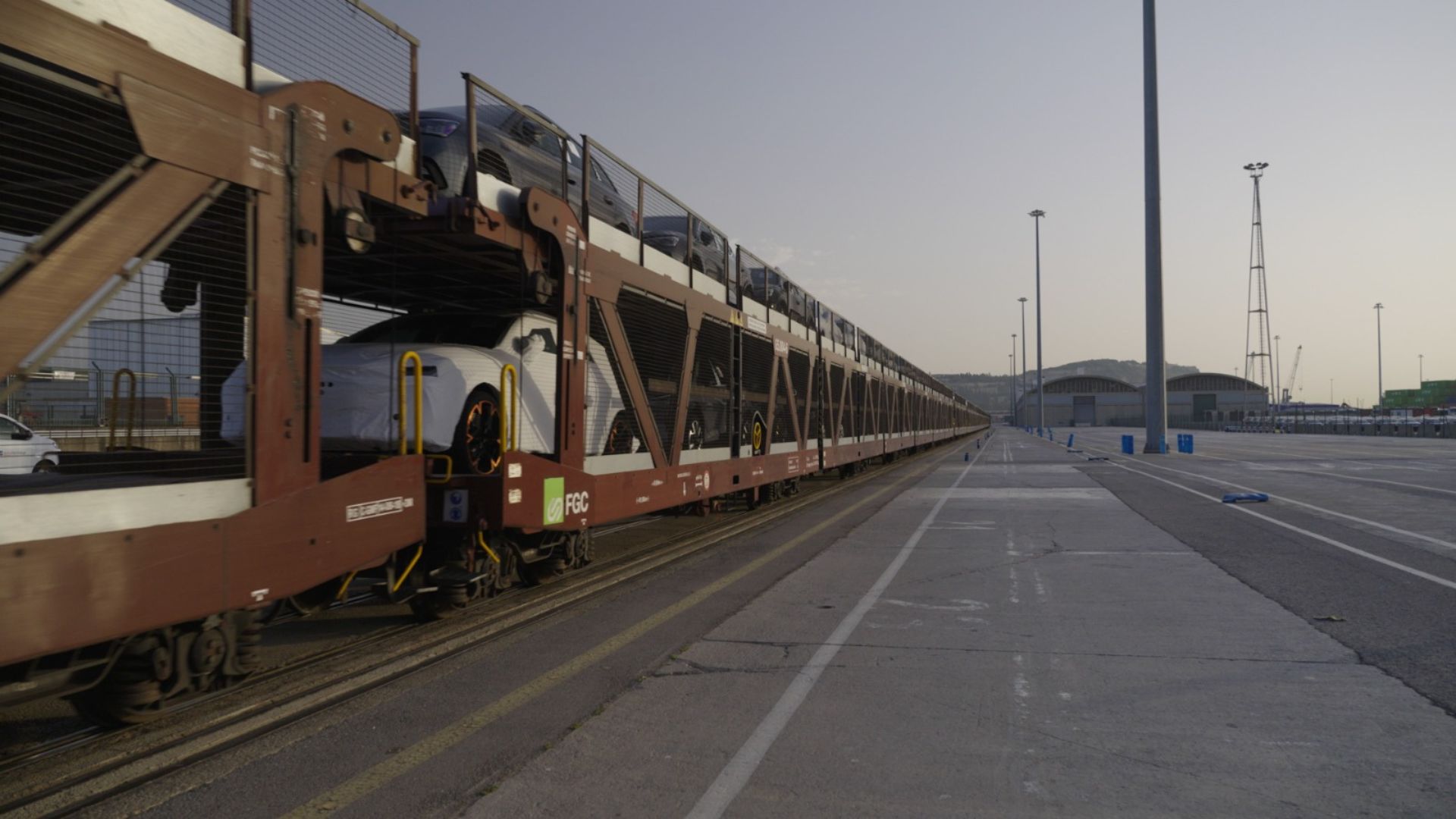 The new car terminal in Barcelona port is going to cost 75 million U.S. dollars and is strategically located on prime maritime, road, and rail routes, allowing Chinese EVs to enter the southern and central European markets. /CGTN