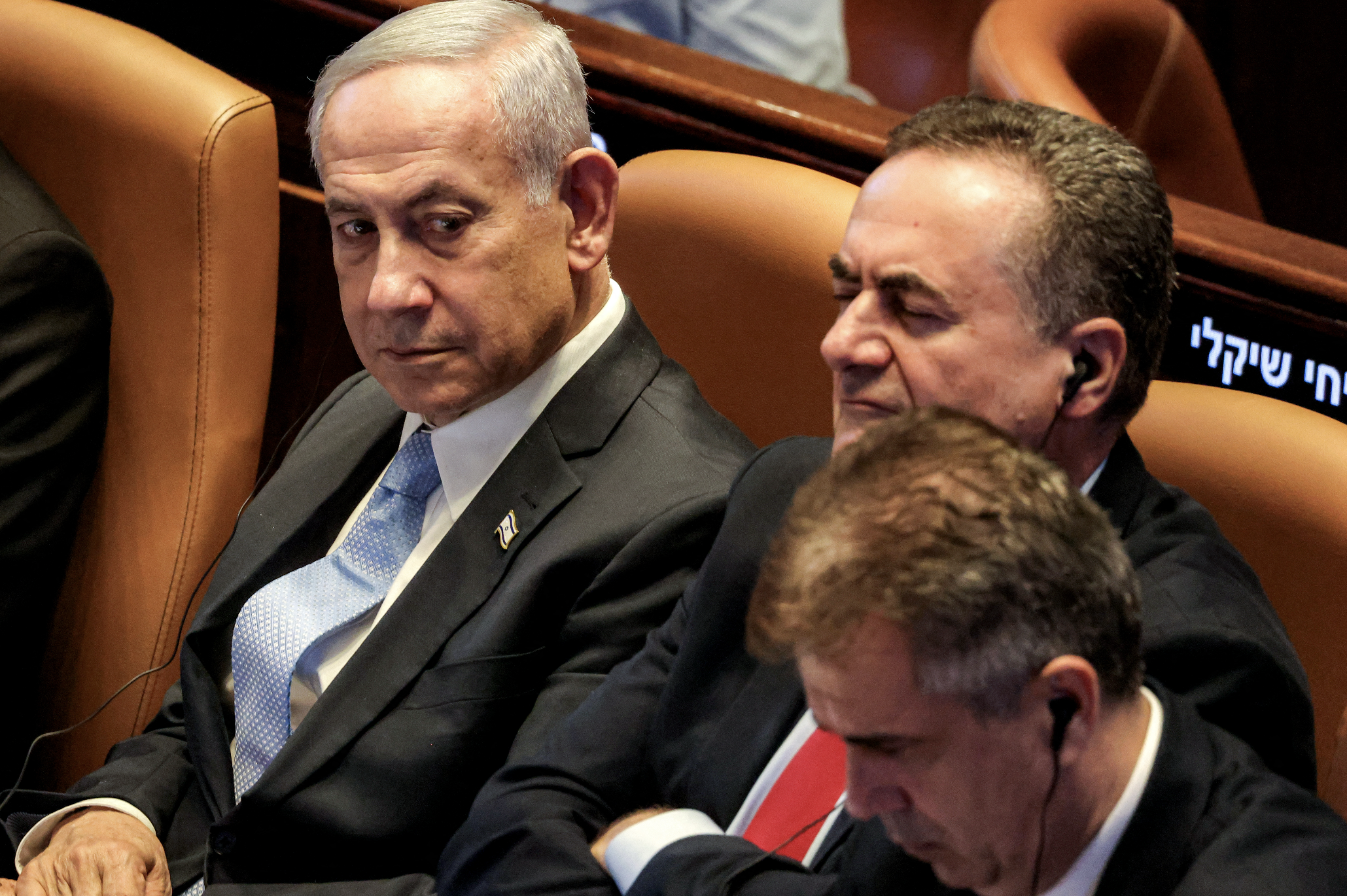 Israel's (L to R) Prime Minister Benjamin Netanyahu, Defence Minister Israel Katz, and Energy and Infrastructure Minister Eli Cohen. / AFP
