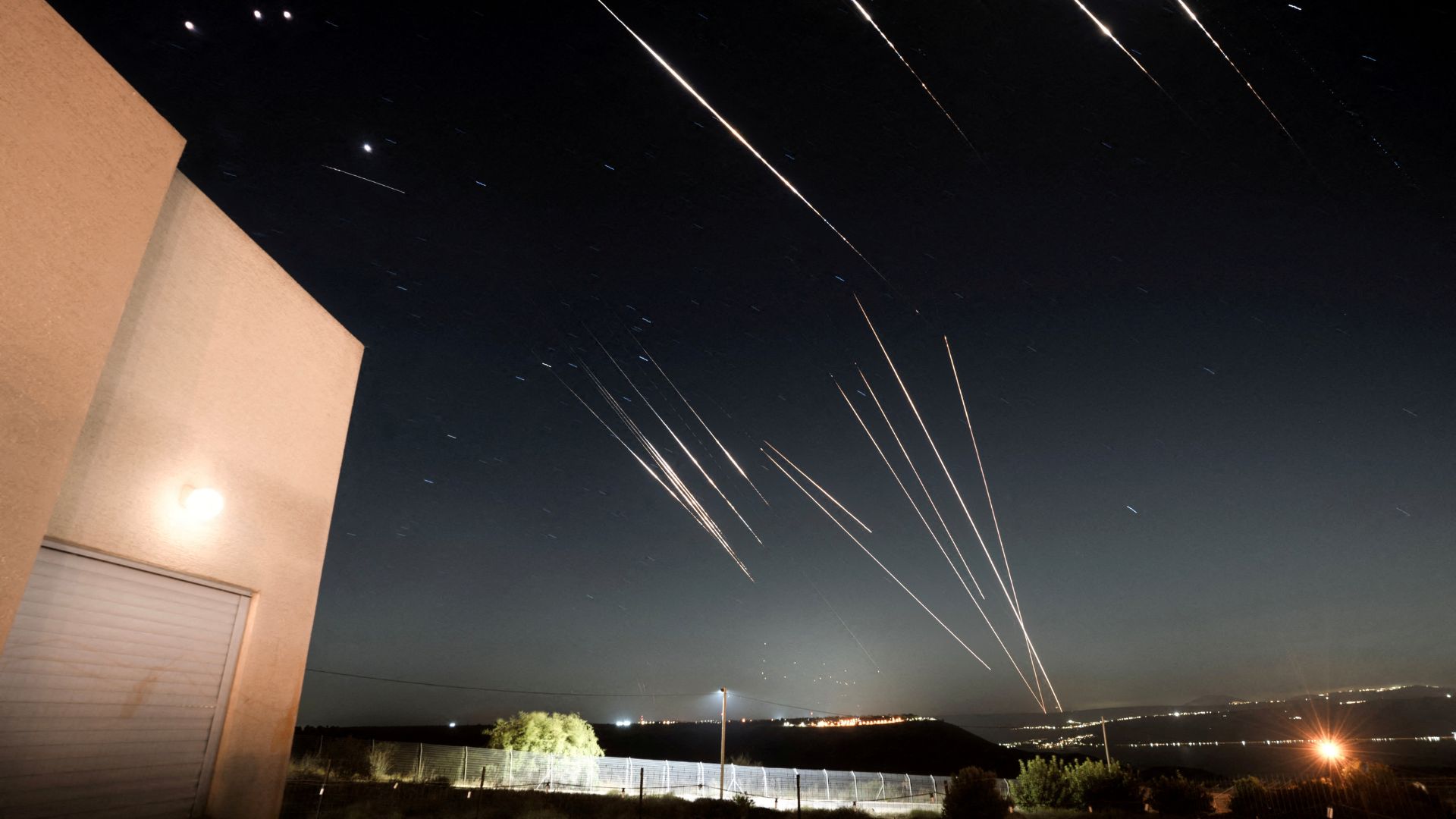 Missiles launched from Iran are intercepted as seen from the Israeli-occupied Golan Heights. /Gal Twig/Reuters 