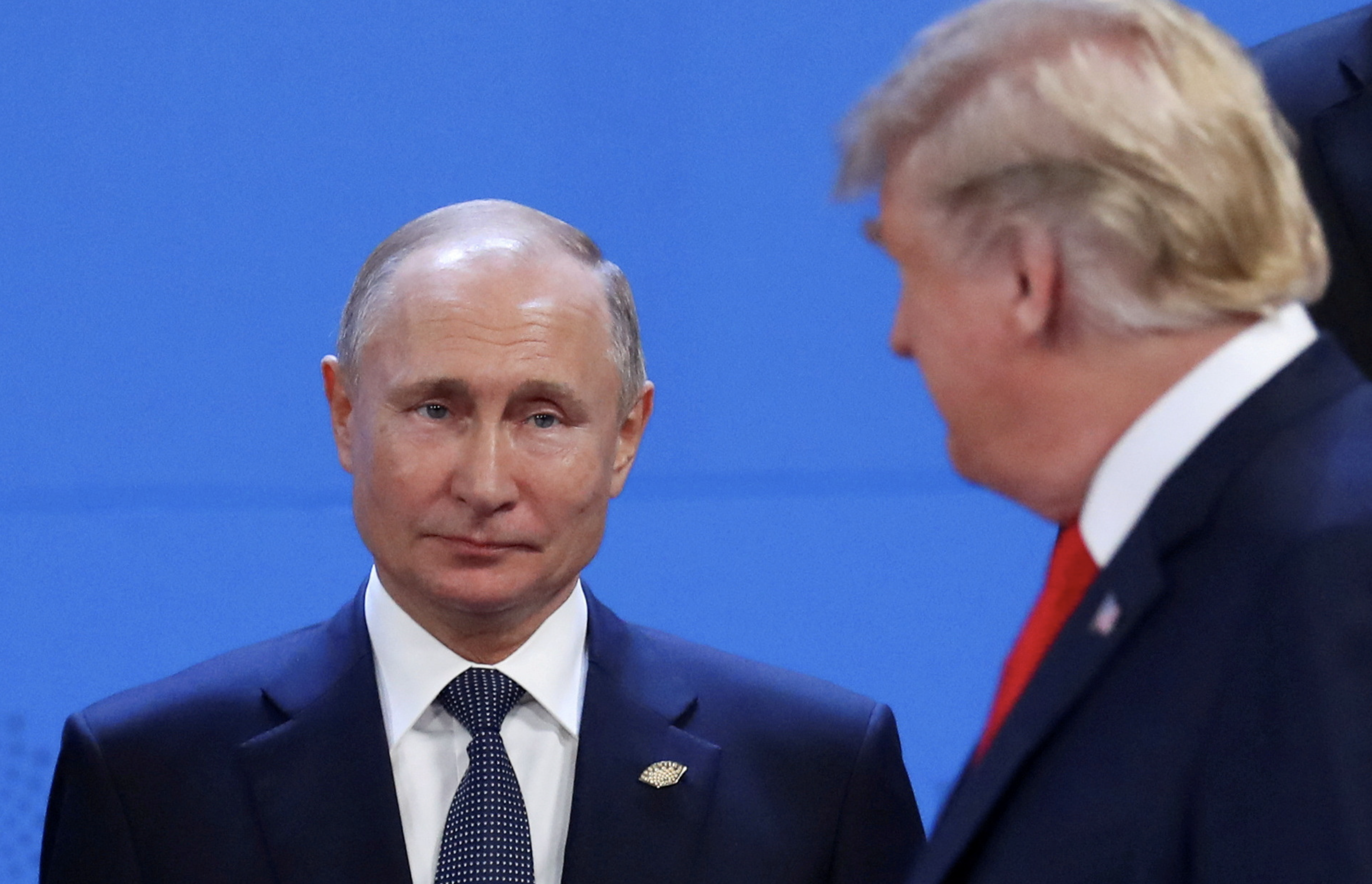 FILE PHOTO: U.S. President Donald Trump and Russia's President Vladimir Putin are seen during the G20 leaders summit in Buenos Aires, Argentina November 30, 2018. REUTERS/Marcos Brindicci
