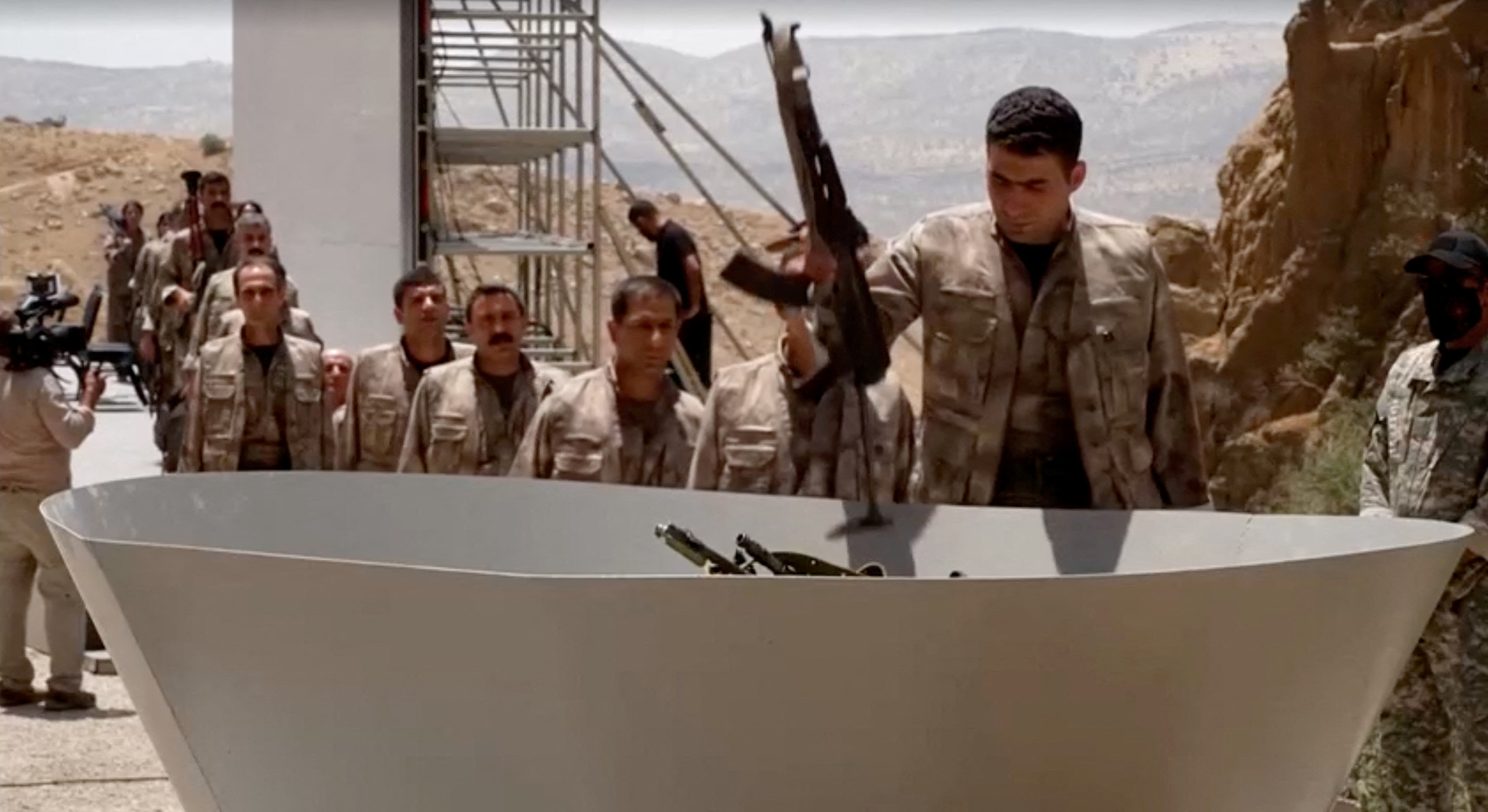Kurdish PKK burns weapons amid push for peace with Turkiye