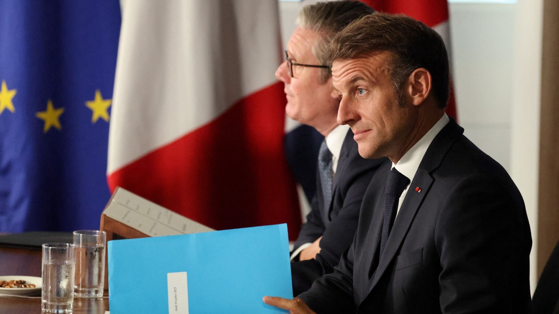 Starmer and Macron in conference with NATO leaders during a Coalition of the Willing meeting. /Ludovic Marin/Pool/AFP