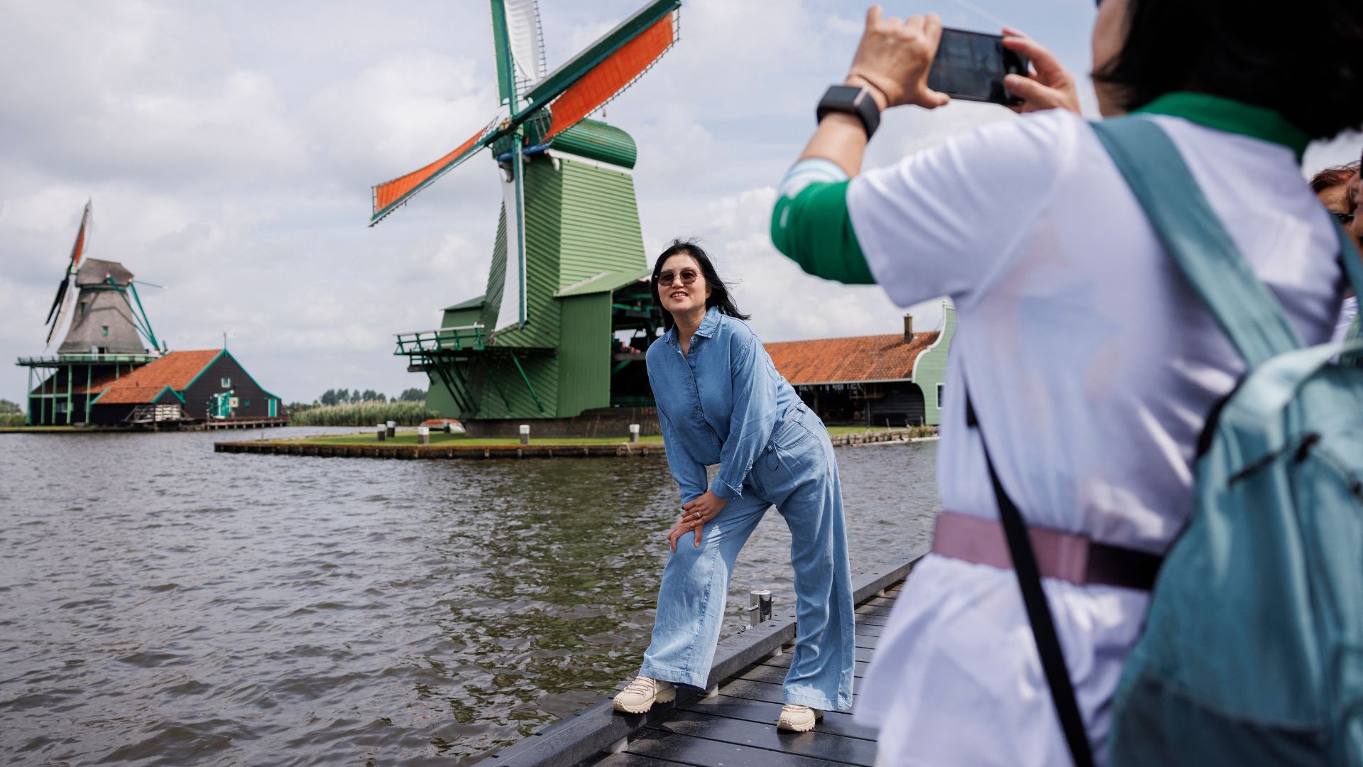 Some locals worry about overtourism – but others fret that charging may affect business. /Simon Wohlfahrt/AFP