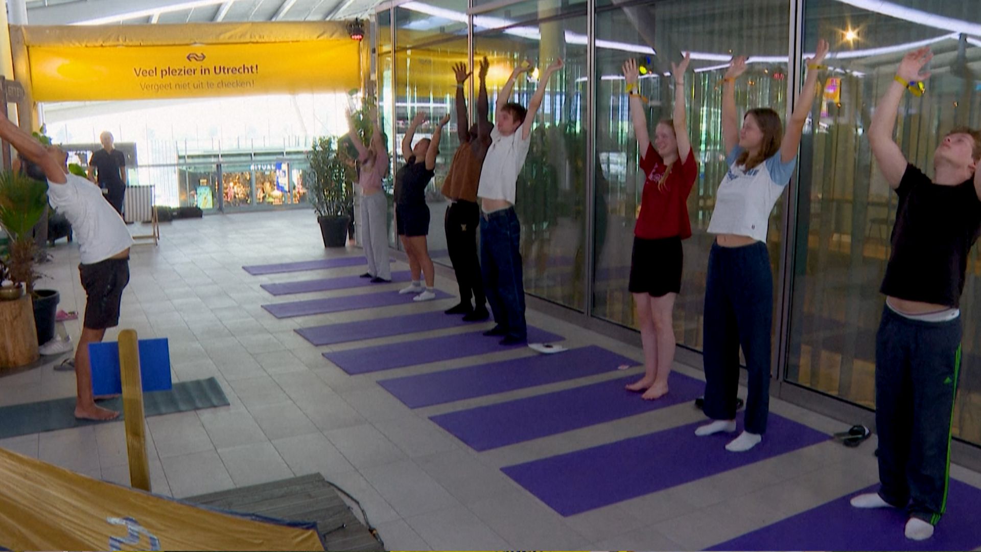  A yoga session takes place inside the 'glampsite'. /AFP