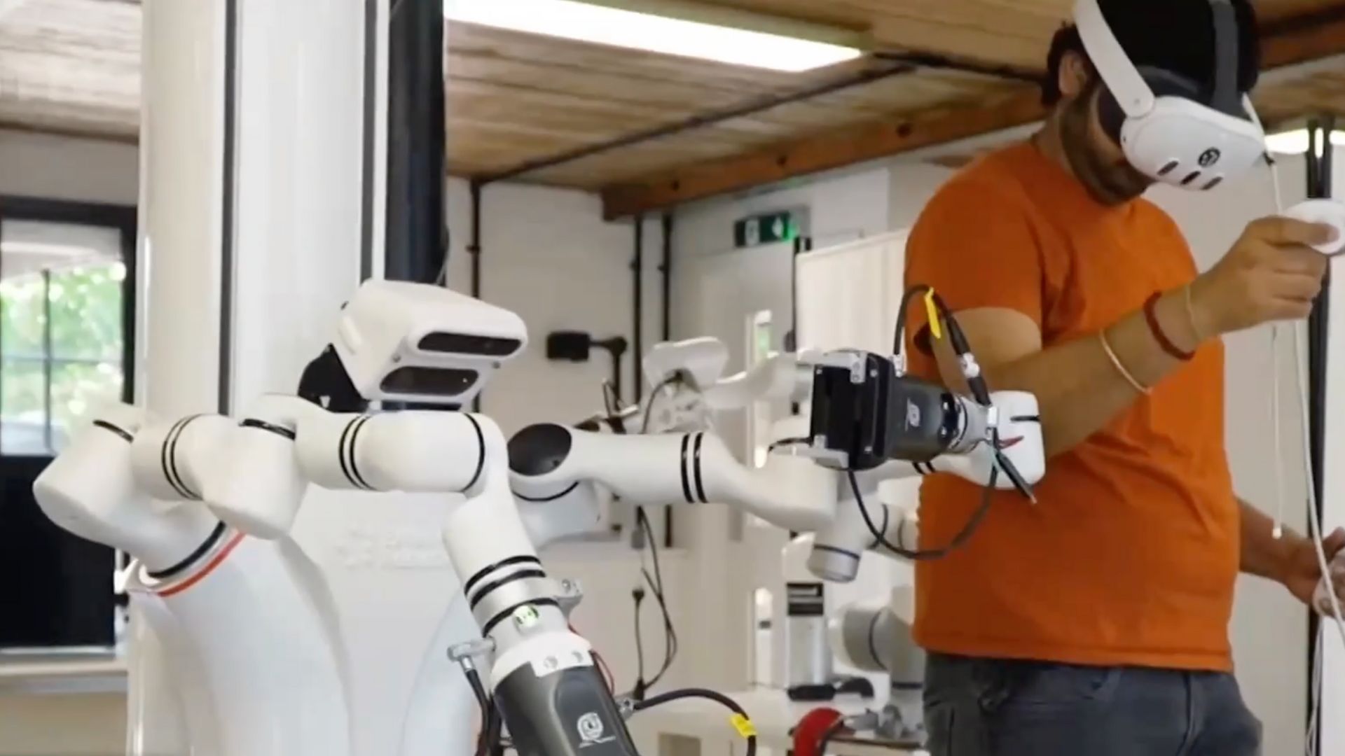 A robot pupil learns a new skill at Extend Robotics. /CGTN