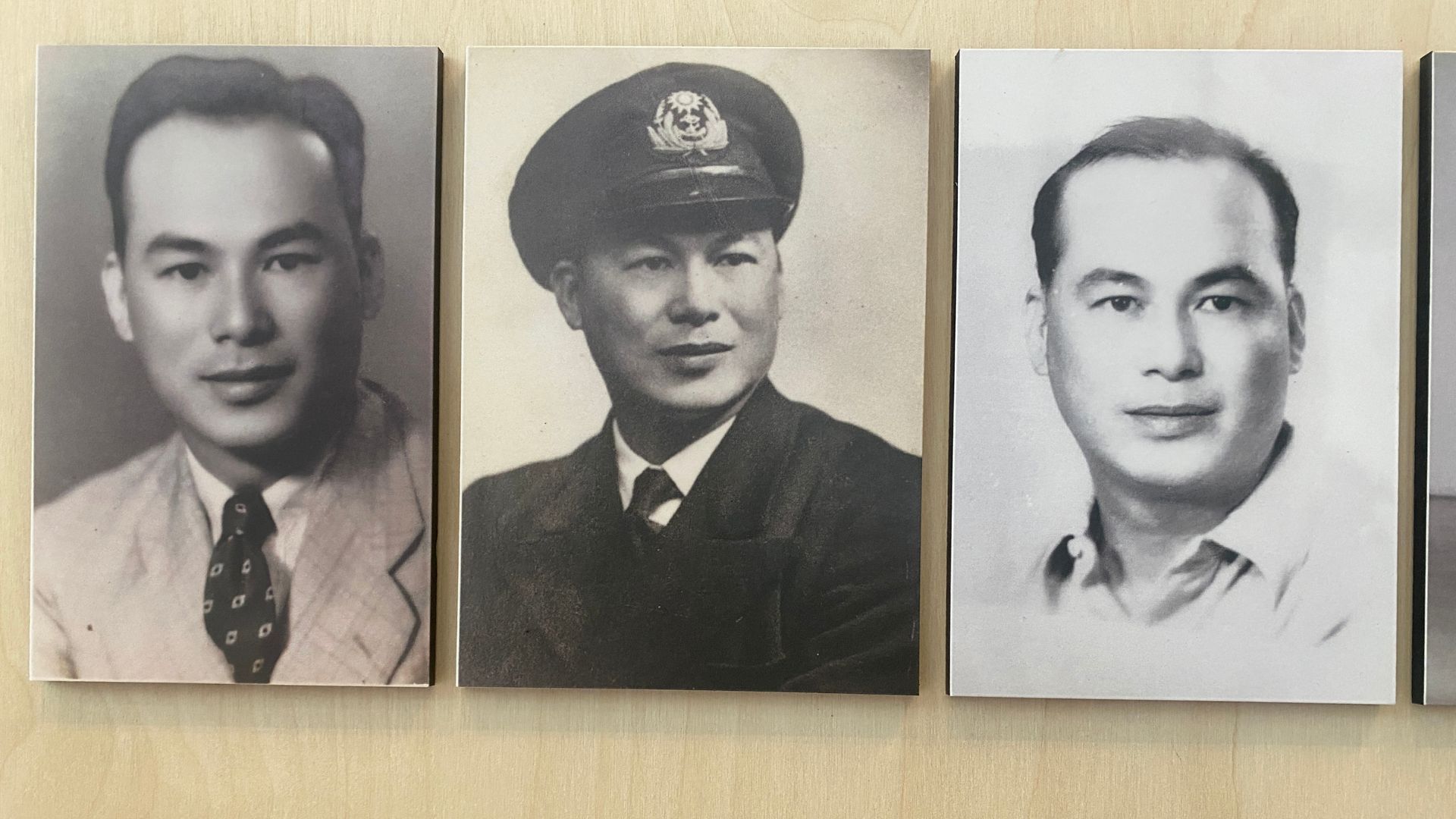 Photos at the exhibition – in the middle is Lam Ping-yu in his naval uniform. /Iolo ap Dafydd/CGTN