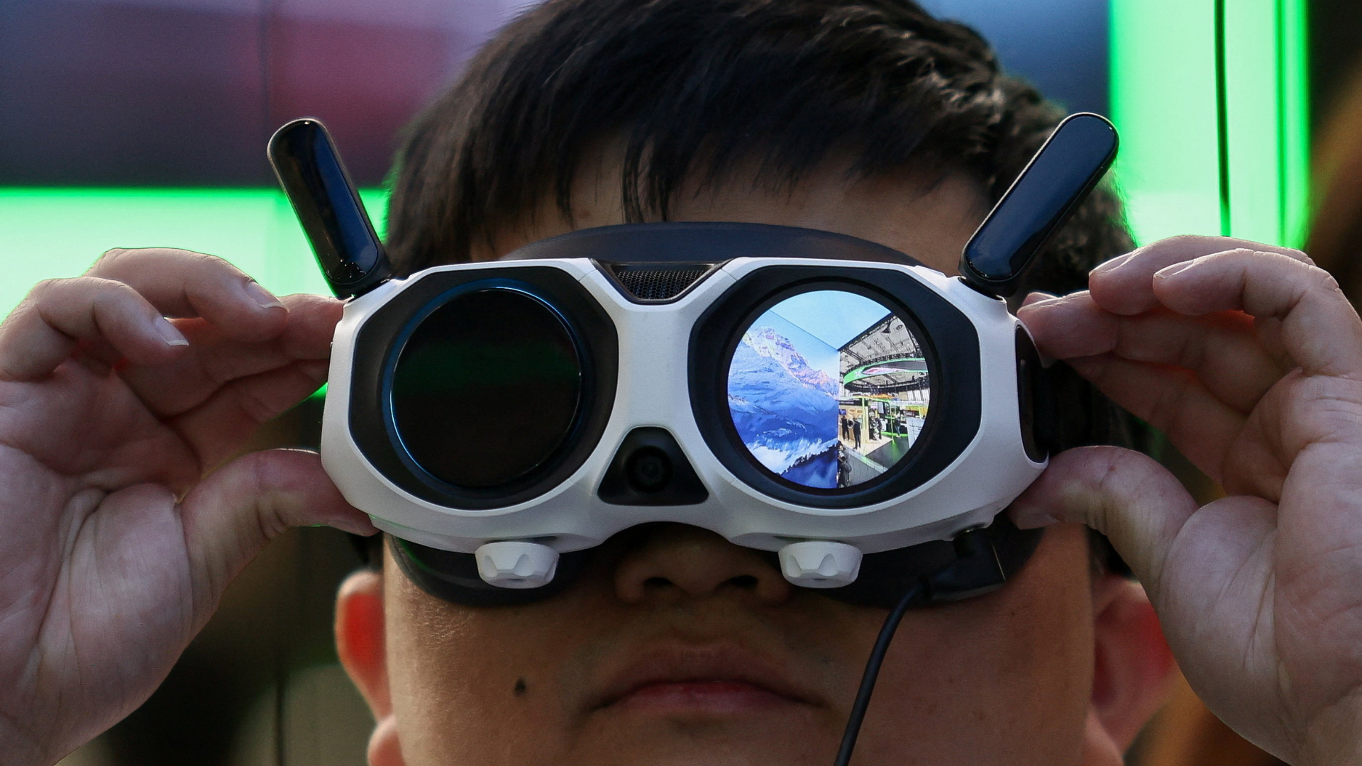 Using goggles for an Antigravity A1 drone on the opening day of Innovation For All. /Maryam Majd/Reuters