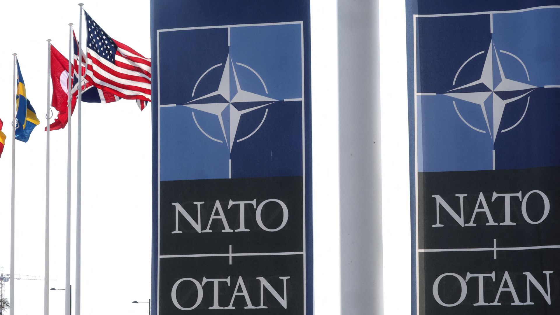 Article 5 says an attack on one NATO country can be considered 'an attack against them all.' /Yves Herman/Reuters