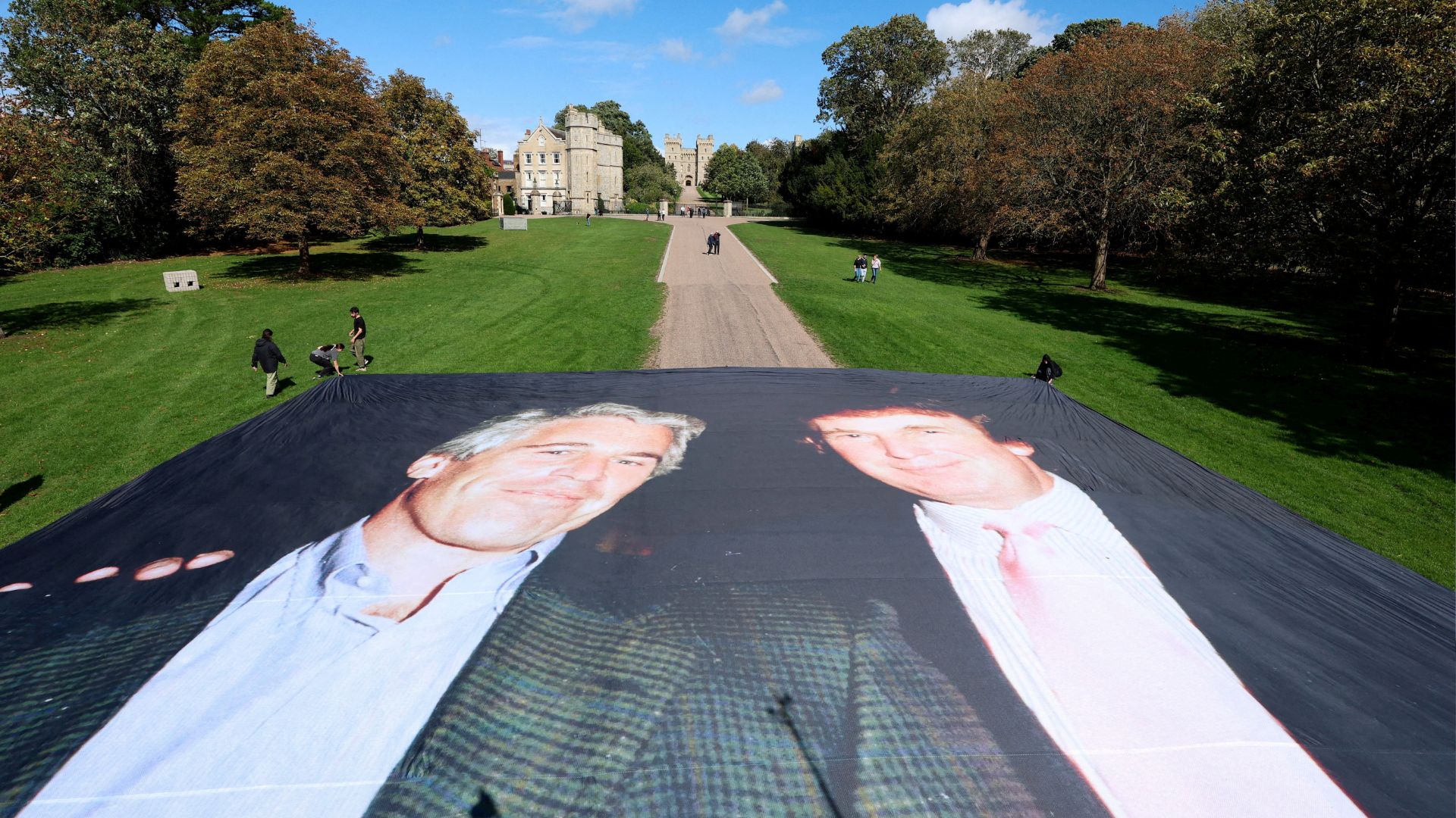 A large banner depicting U.S. President Donald Trump alongside disgraced financier Jeffrey Epstein is displayed near the Windsor Castle by campaign group 'Everyone Hates Elon'. /Hannah McKay/Reuters
