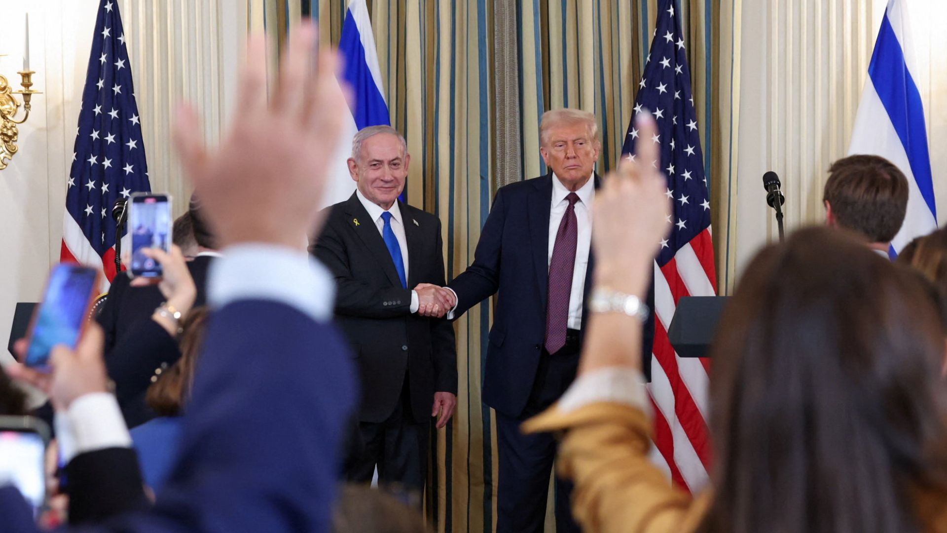 U.S. President Donald Trump and Israeli Prime Minister Benjamin Netanyahu announced the proposed peace deal on September 29. /Jonathan Ernst/Reuters

