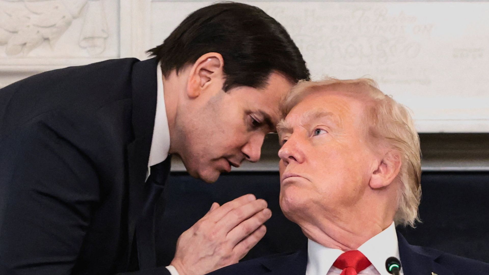 Marco Rubio interrupts Donald Trump to say an agreement is near. /Reuters