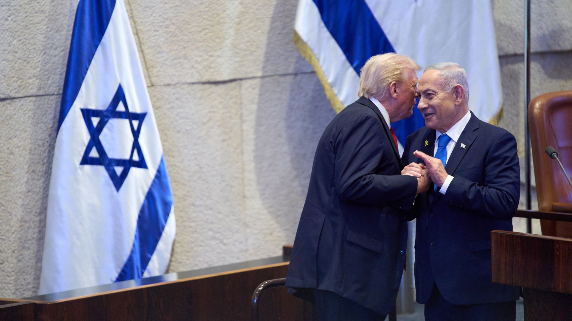 Israel's Prime Minister Benjamin Netanyahu with U.S. President Donald Trump at the Knesset, Israel's parliament, on Monday. /Evan Vucci/Reuters