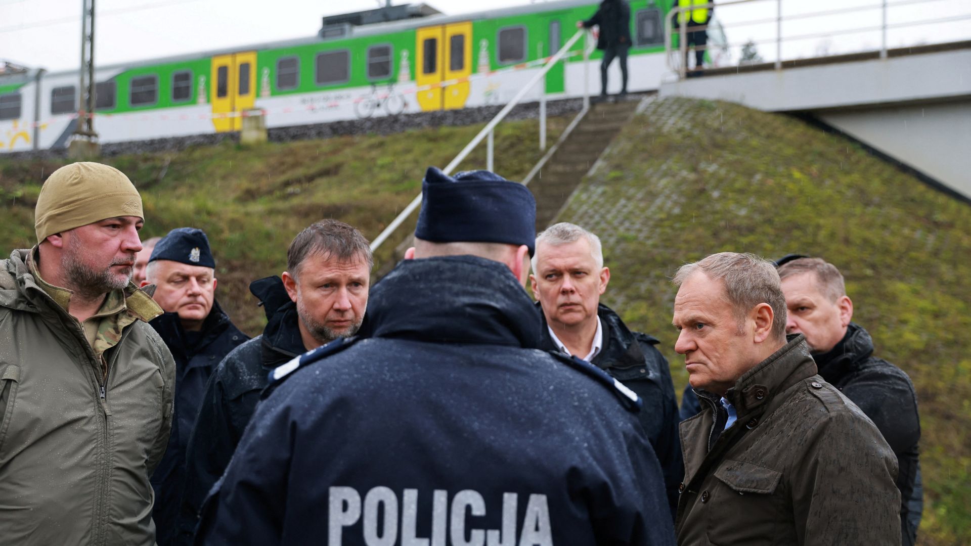 Polish Prime Minister Donald Tusk (2nd right) visits the site of a blast on railway of the Warsaw-Lublin line in Mika, Poland, November 17, 2025. /KPRM/Handout via Reuters