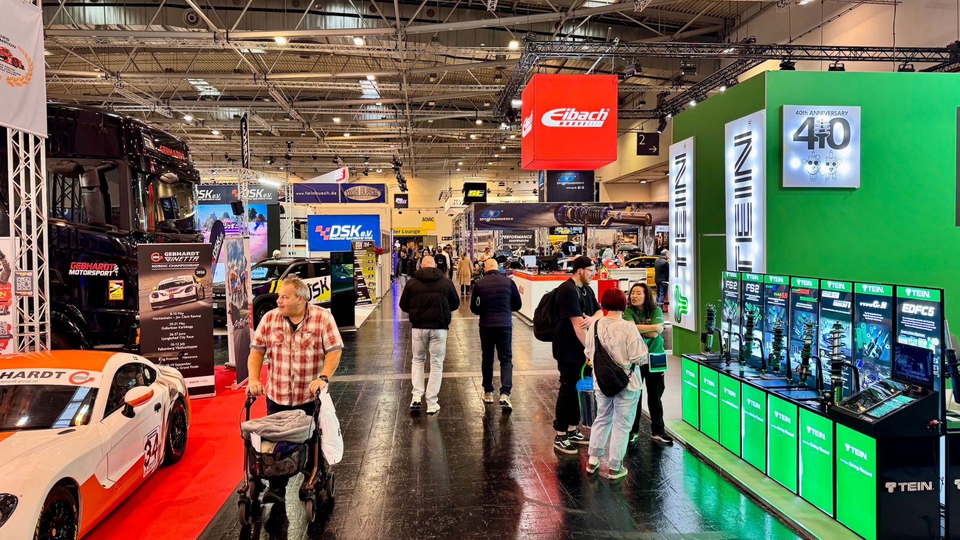 Visitors enjoy the exhibits at the Essen Motor Show. /CGTN