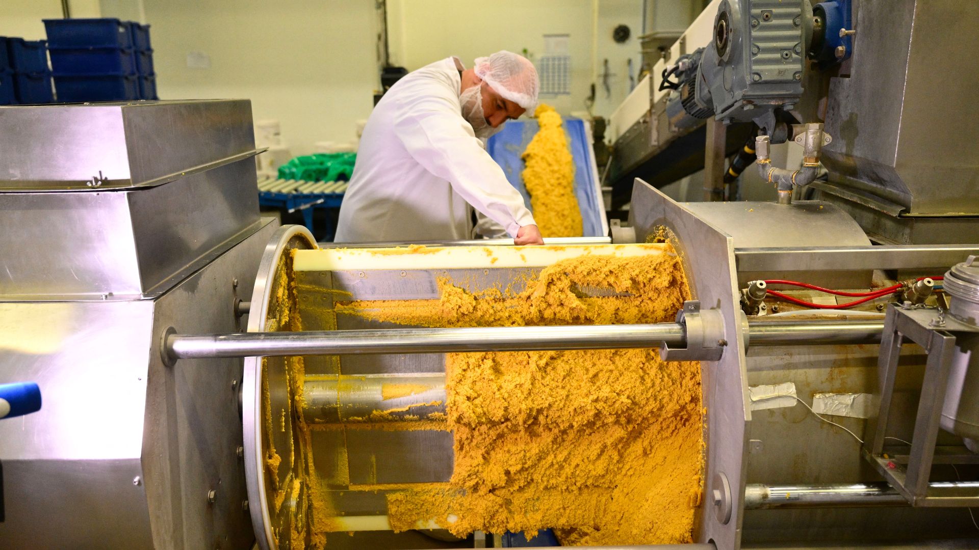 Employees work at the Le Roy Rene factory producing traditional pastries called calissons made with almonds in Aix-en-Provence. /Christophe Simon/AFP
