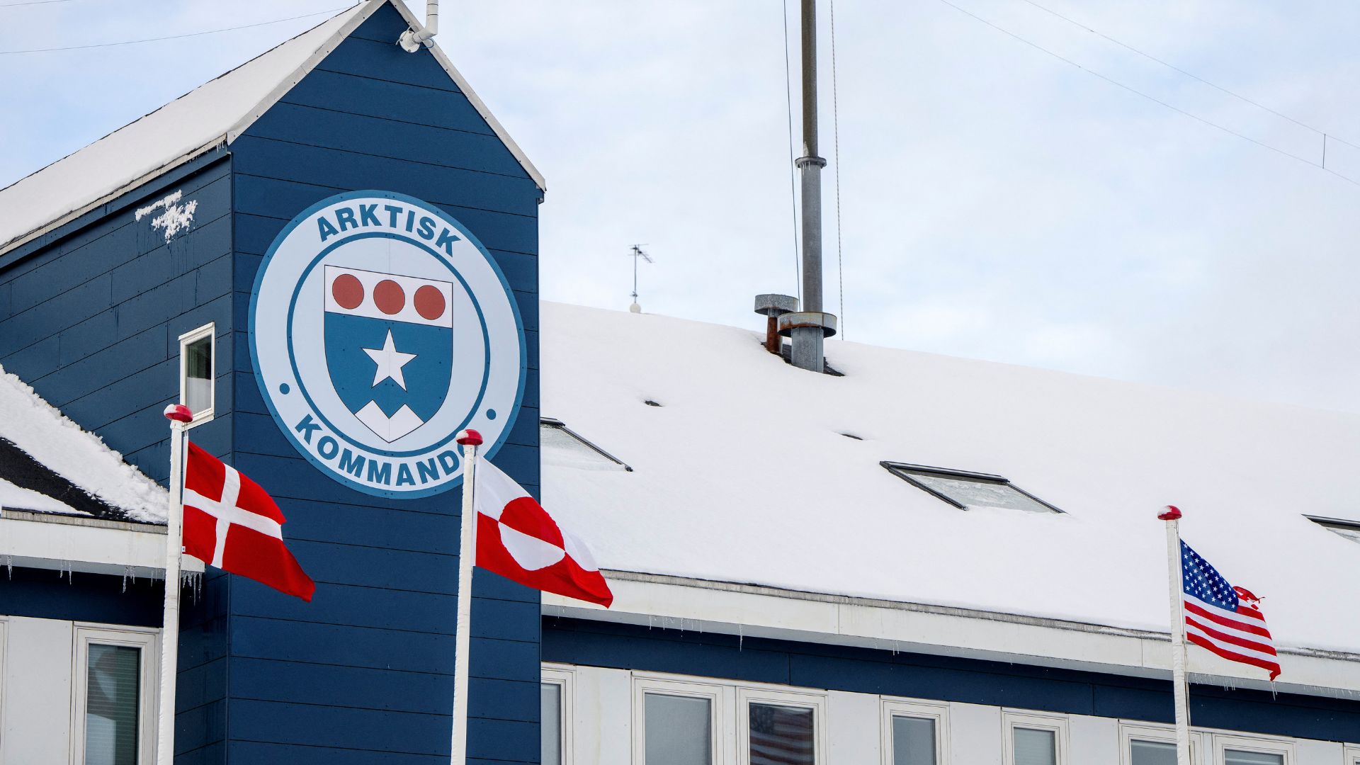 Danish, Greenlandic and US flags fly at the Danish armed forces' Arctic Command in Nuuk, Greenland. /Mads Claus Rasmussen/Ritzau Scanpix/Reuters
