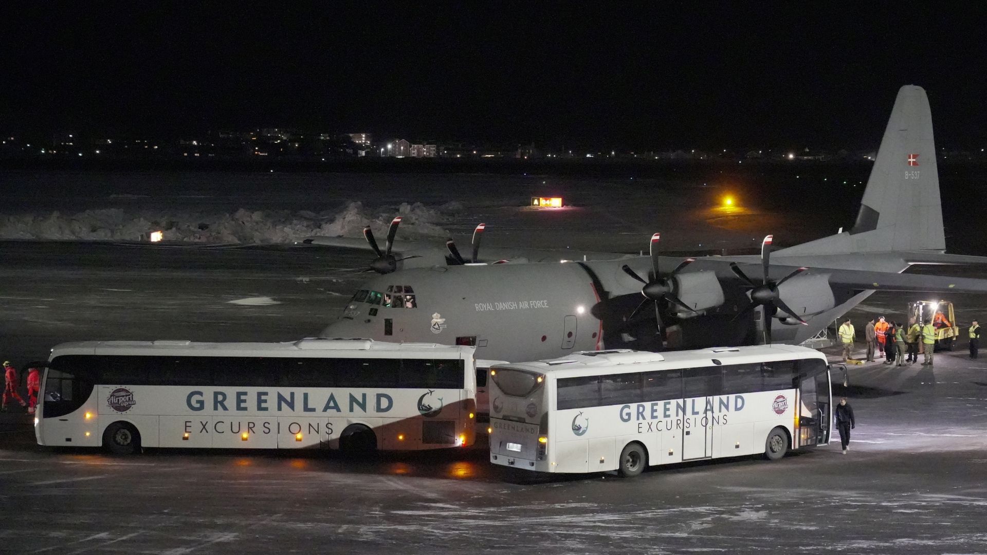 A Royal Danish Air Force plane carrying personnel in military fatigues lands at Nuuk airport Greenland on January 14, 2026.  /Janis Laizans/Reuters

