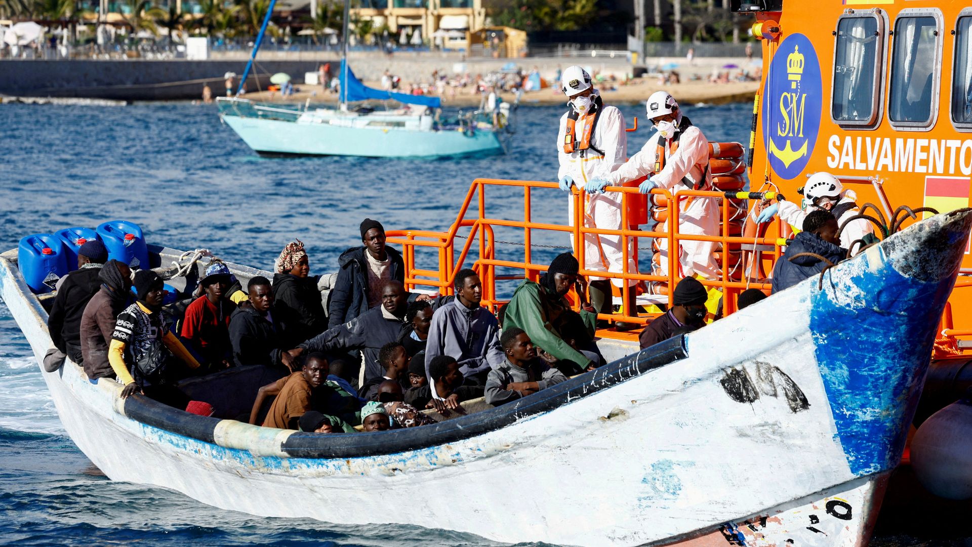 A Spanish Coast Guard vessel tows a fibreglass boat with migrants onboard to the port of Arguineguin, on the island of Gran Canaria, Spain, on March 5, 2025. /Borja Suarez/Reuters/File
