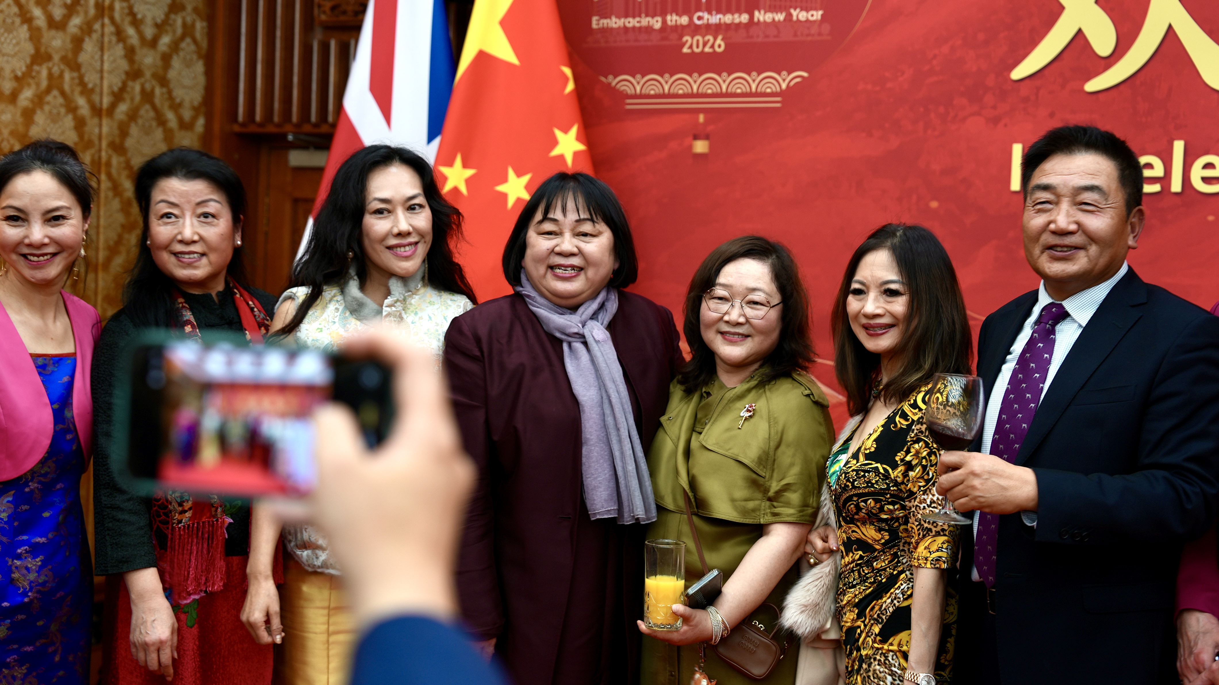 Guests taking a group photo at the reception./CGTN Europe