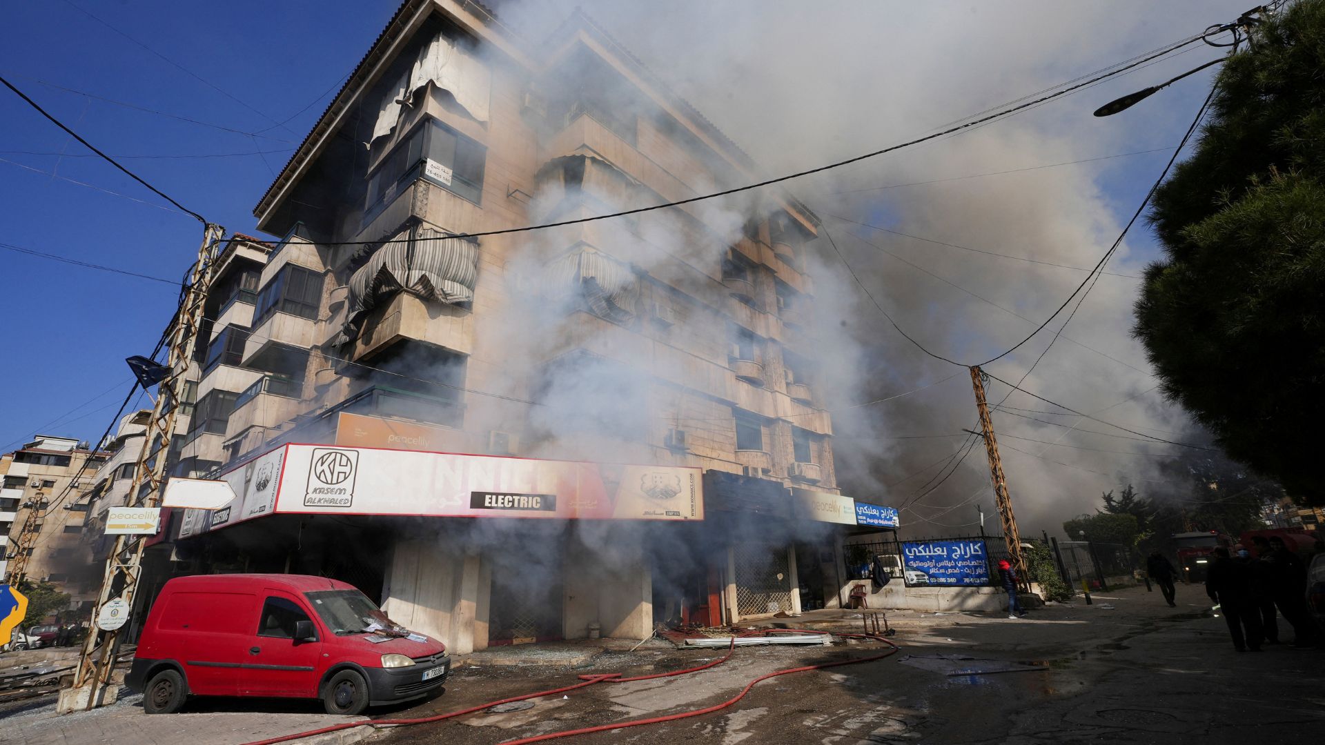 Smoke billows from a building at the site of an Israeli strike on Beirut's southern suburbs on March 3. /Stringer/Reuters
