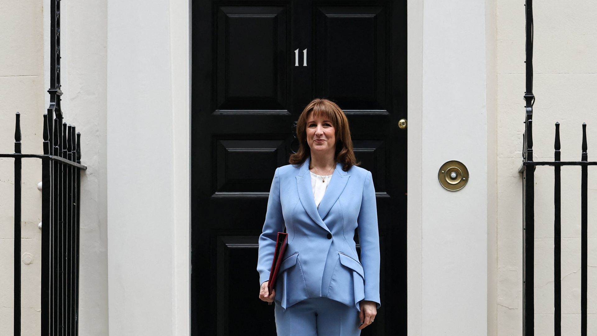 British Chancellor of the Exchequer Rachel Reeves poses outside 11 Downing Street ahead of presenting the Spring Forecast to Parliament. /Toby Melville/Reuters