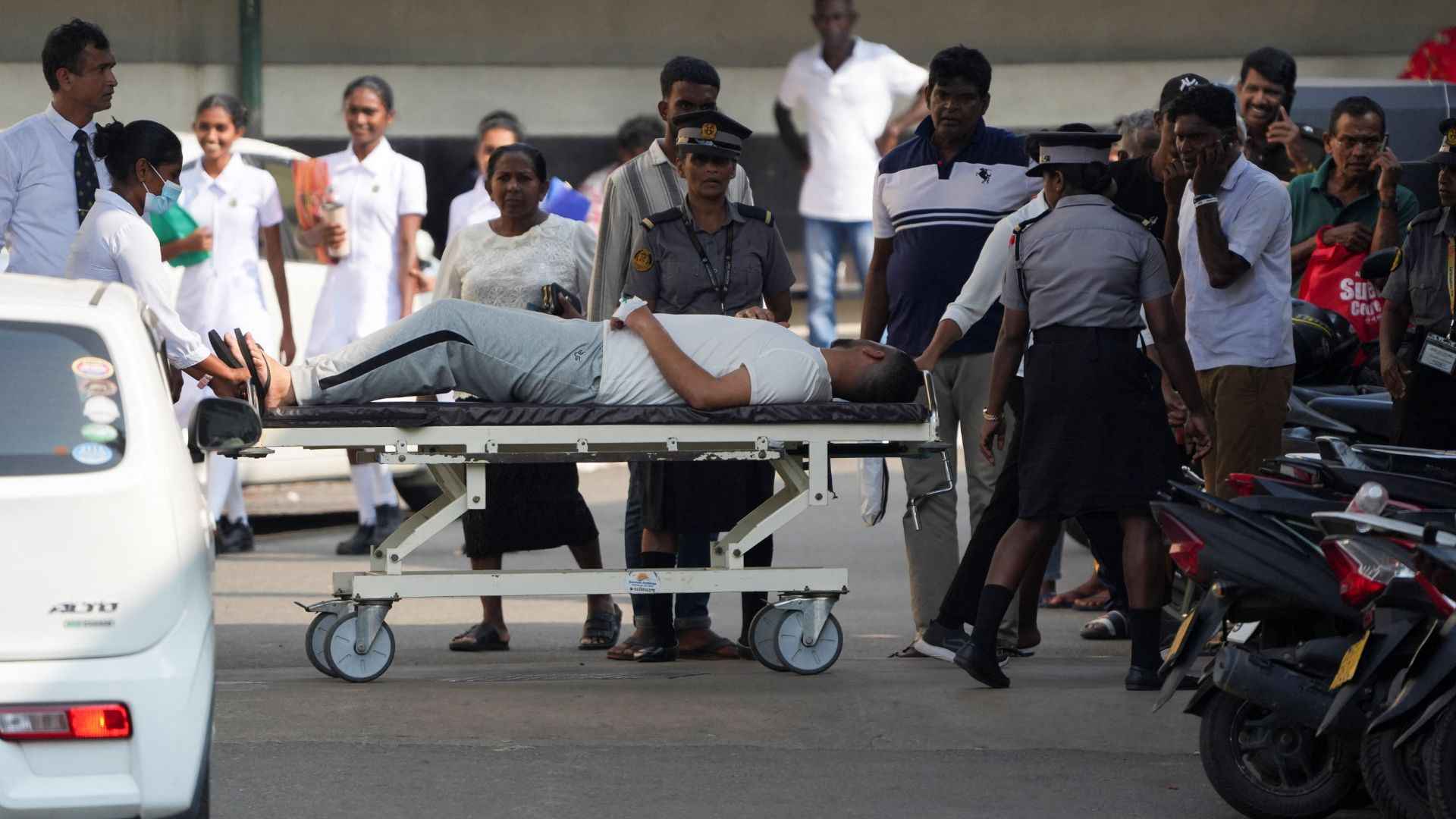 An injured Iranian sailor is moved on a stretcher at Sri Lanka's Galle National Hospital on March 5. /Thilina Kaluthotage/Reuters
