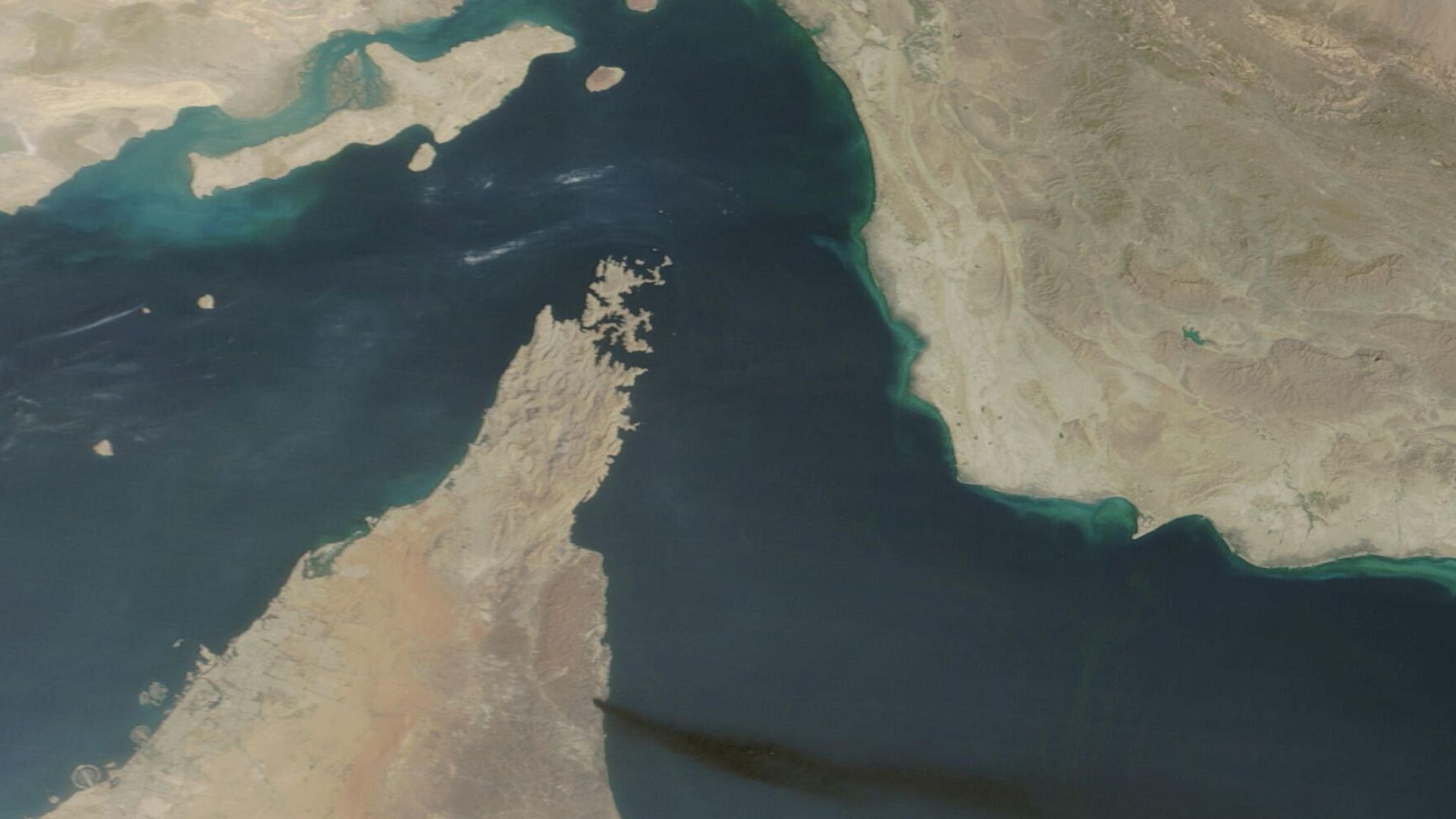 Satellite image shows smoke rising from UAE's Fujairah port. /NASA Worldview/Reuters
