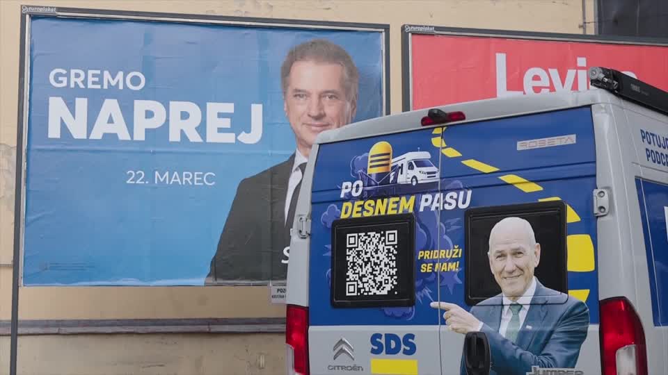 Campaign imagery for Golob (L, on wall) ad Jansa (R, on van). /Reuters